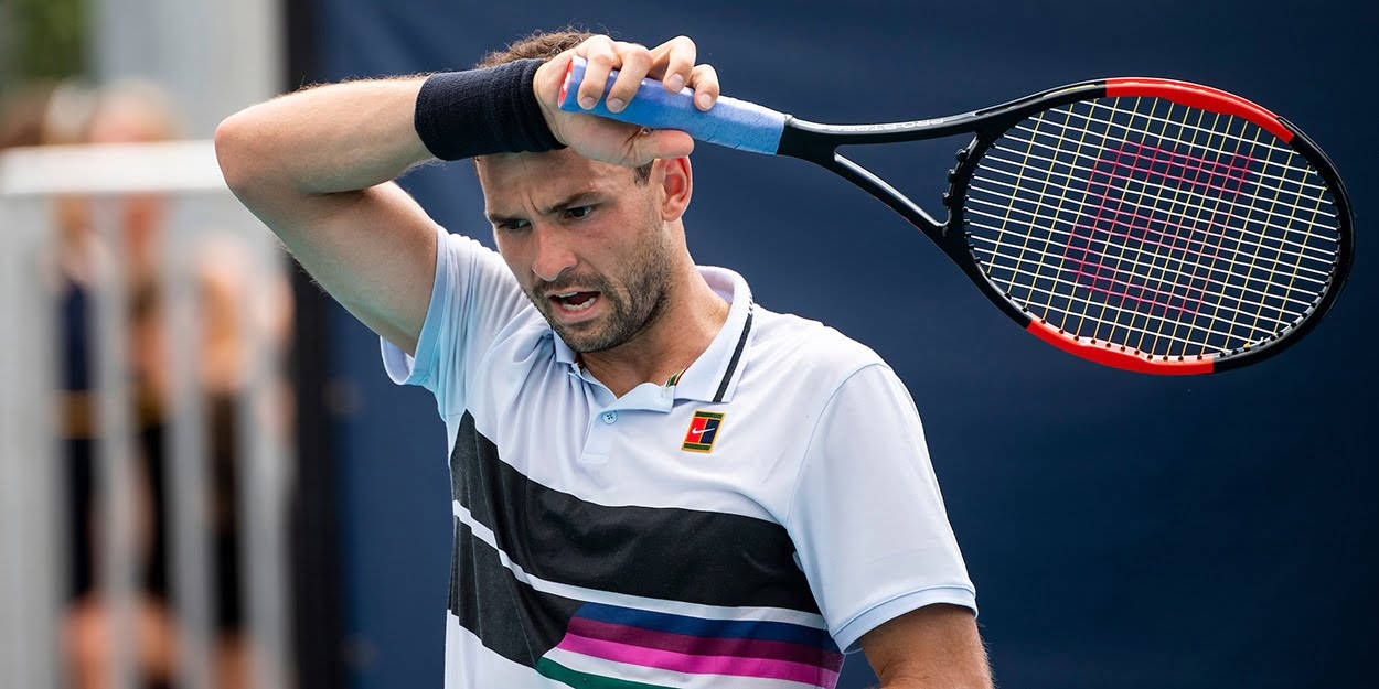 Grigor Dimitrov Wiping His Forehead Background