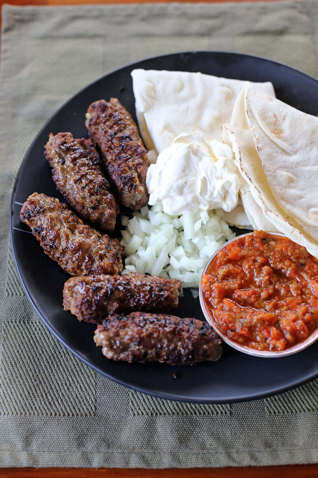 Grilled Ćevapi With Thin Pita Bread Background