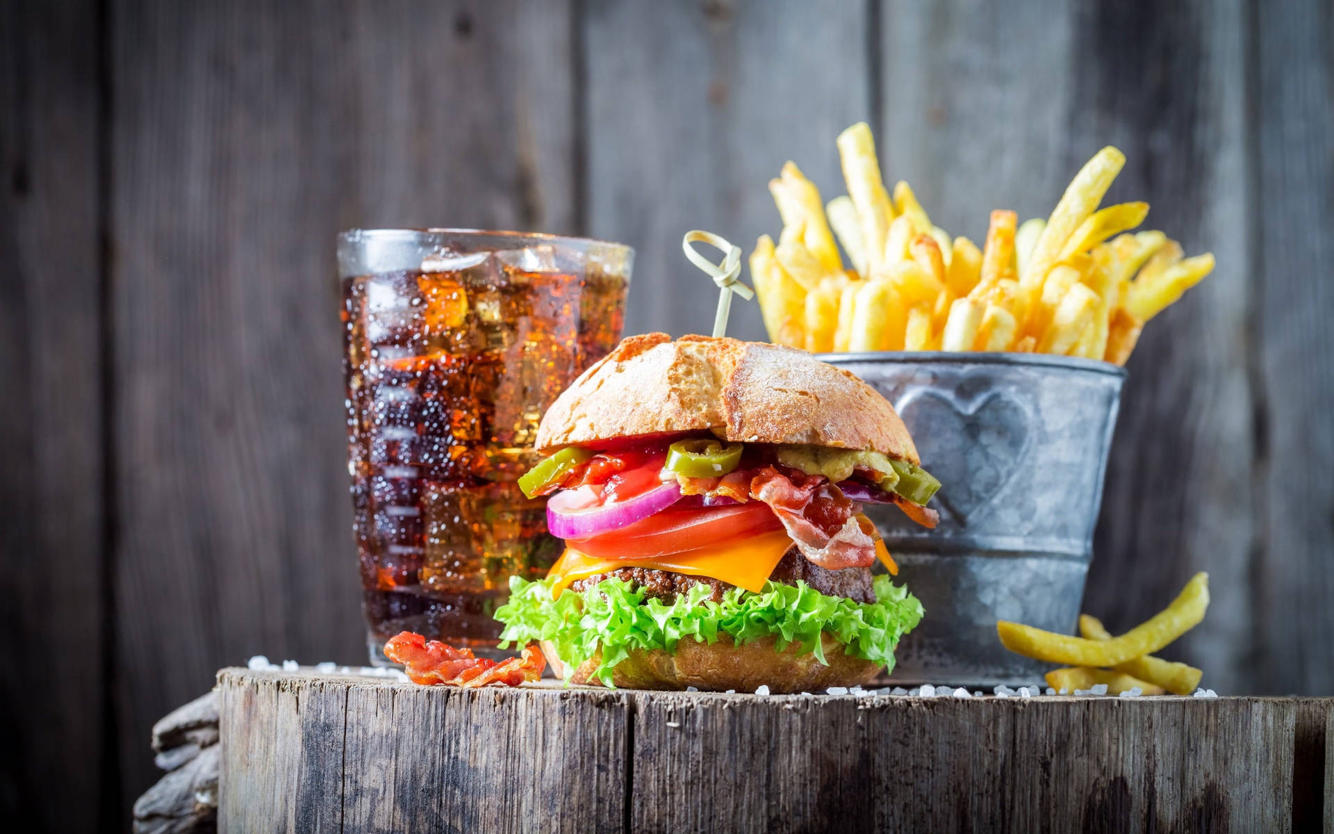 Grilled Cheeseburger With Ice Tea And Fries