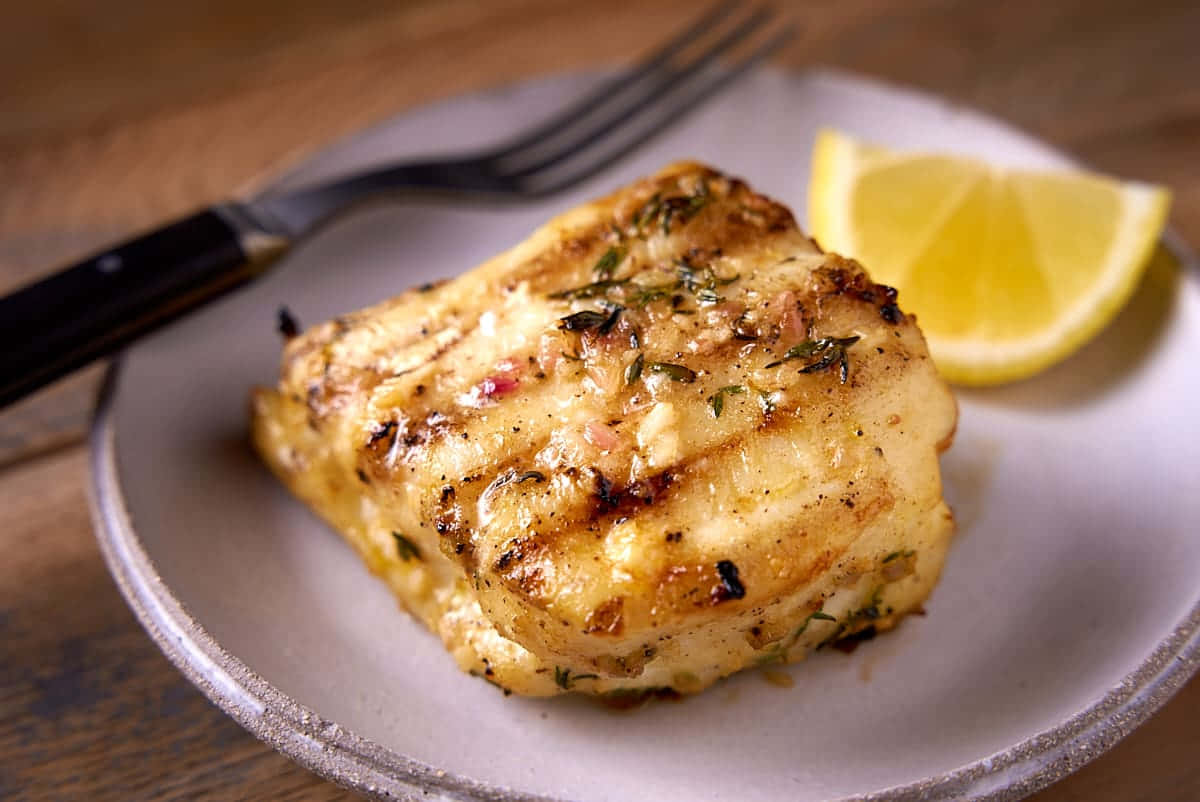 Grilled Halibut Steak Lemon Garnish.jpg Background