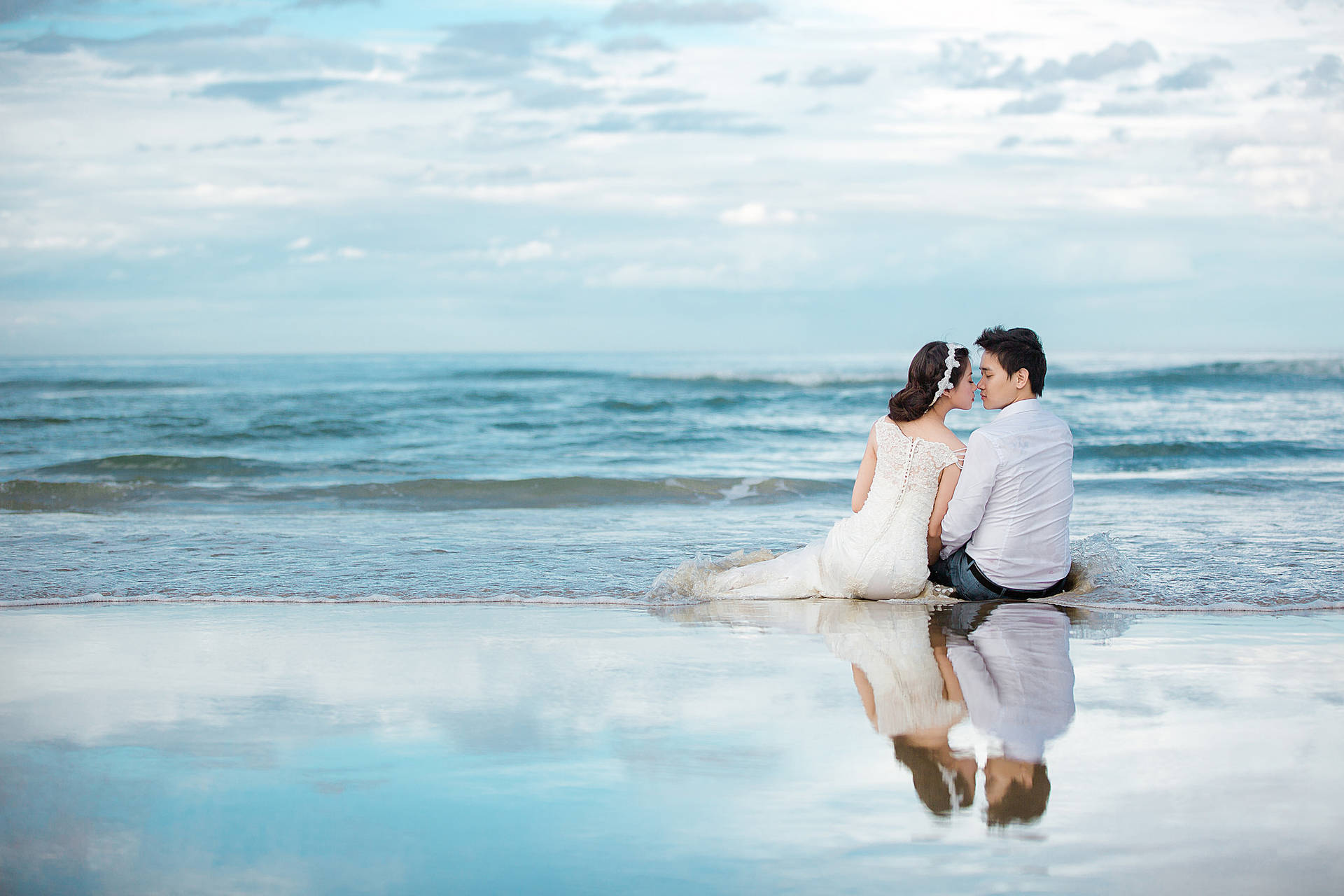 Groom And Bride In Beach Background