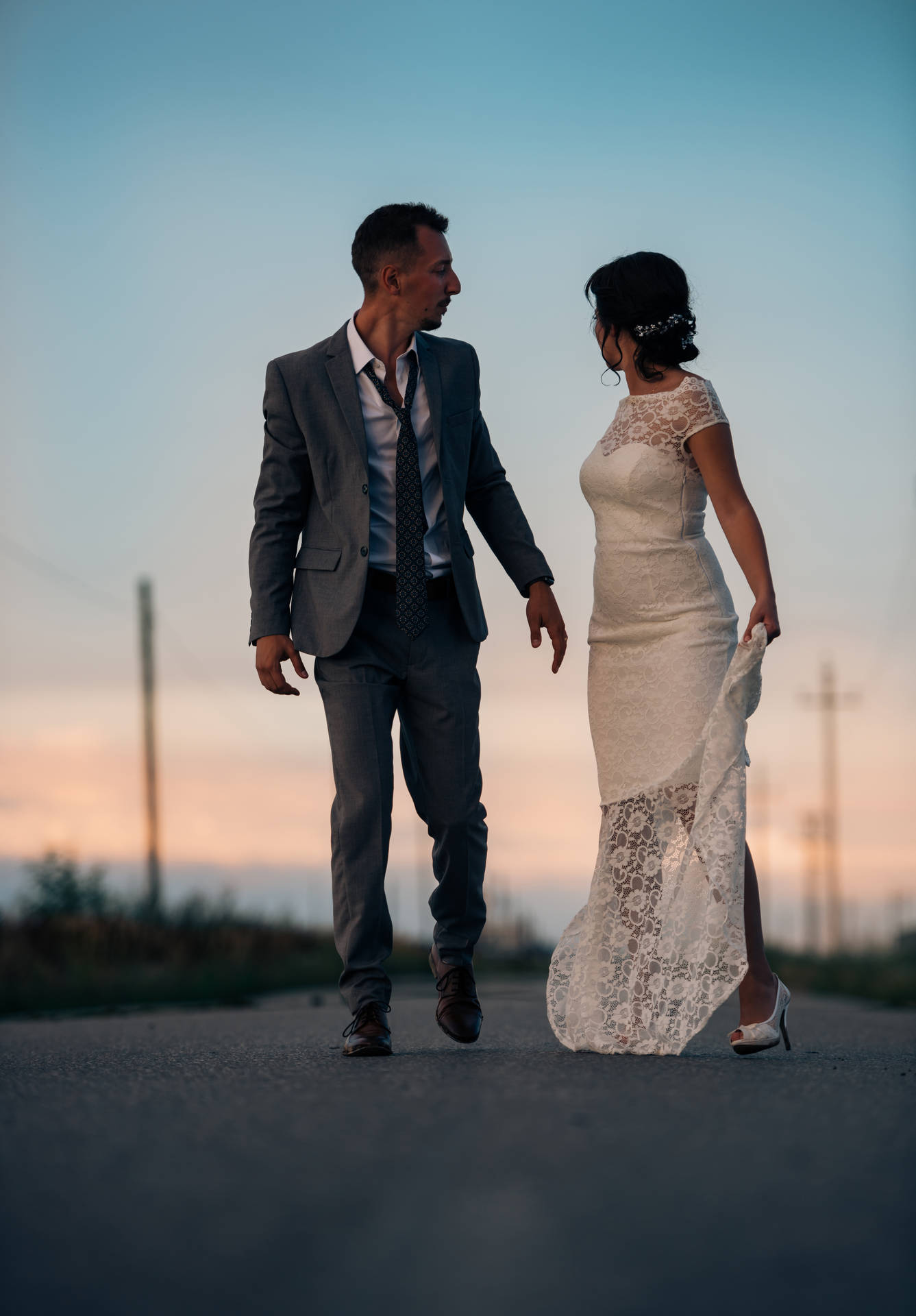 Groom And Bride In Road Background