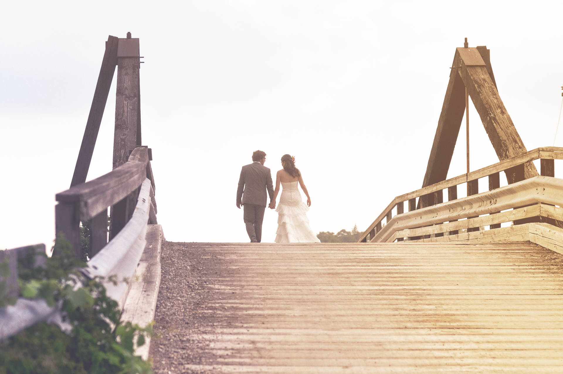 Groom And Bride On Bridge Background