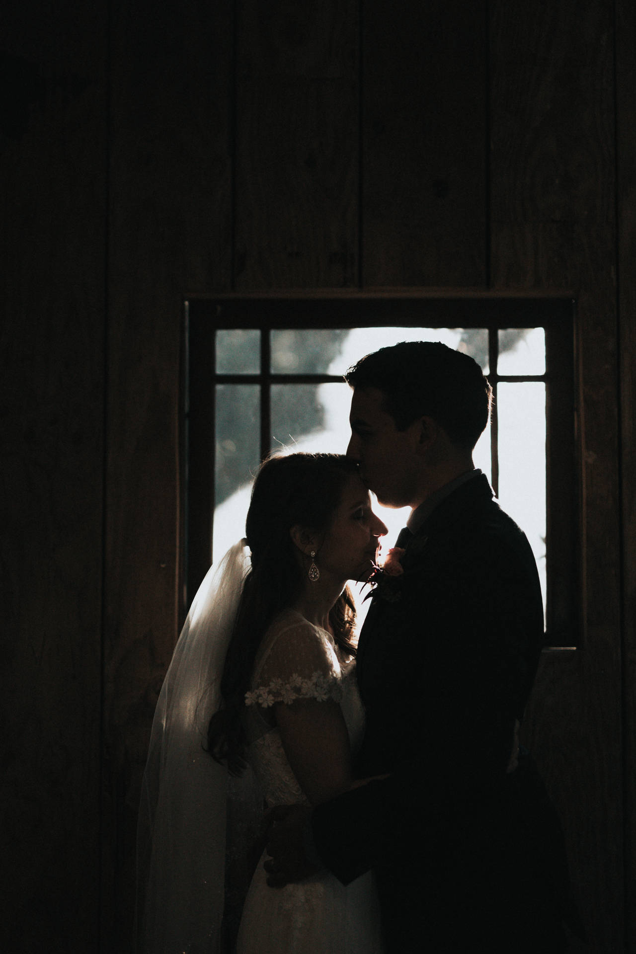 Groom In Dark Room