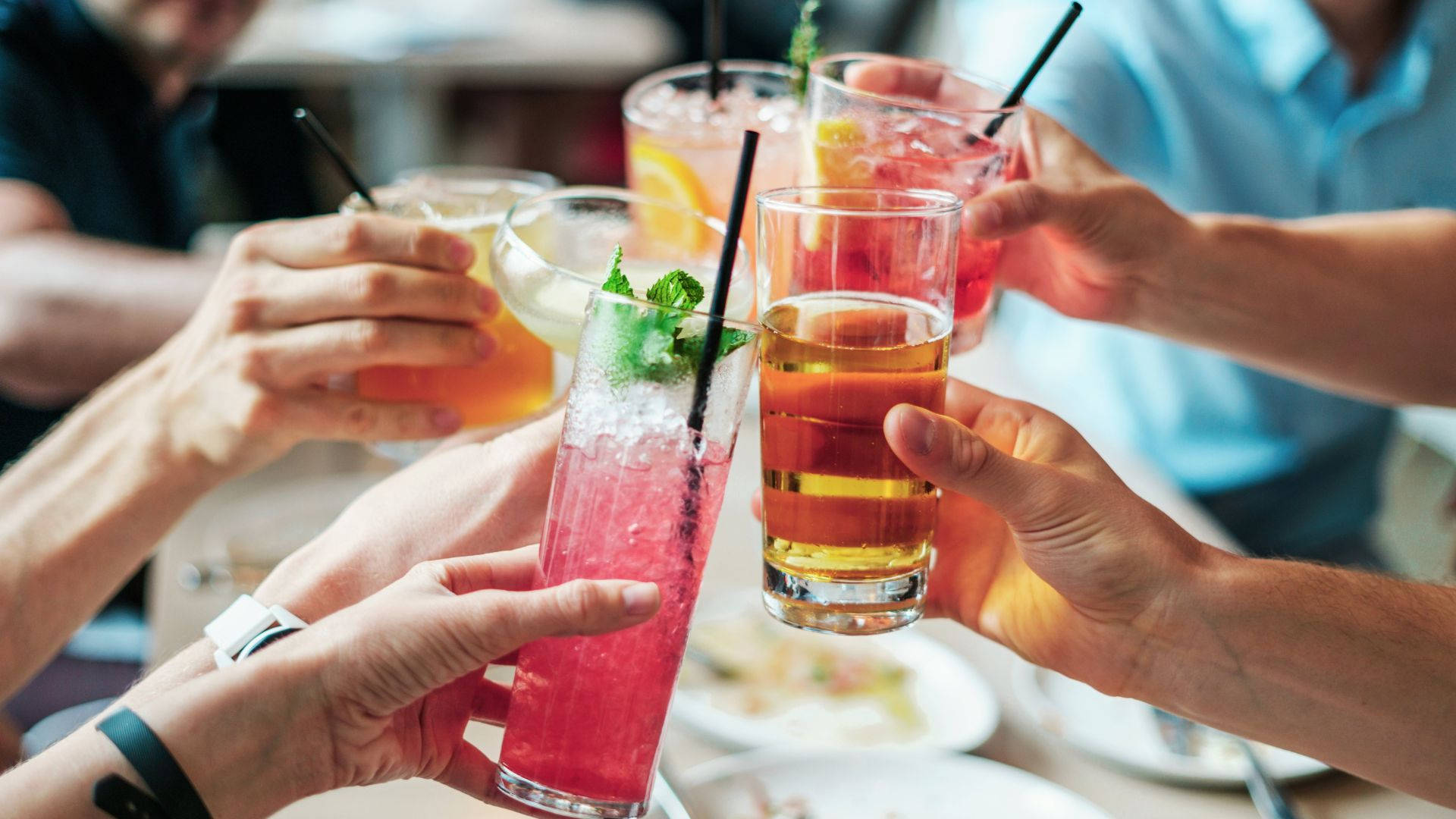 Group Celebration Clinking Of Alcohol Cocktail Background