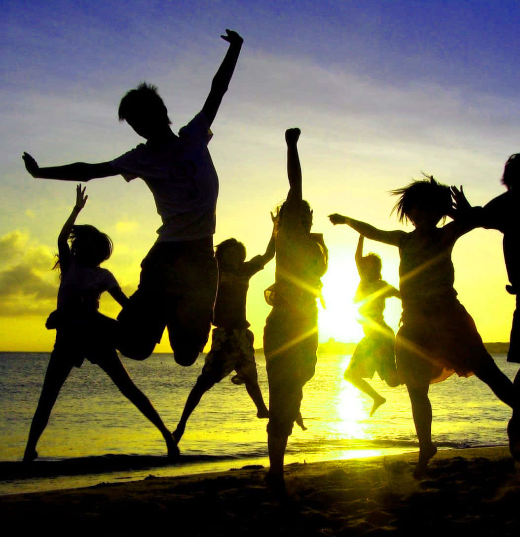 Group Of Friends Silhouette Jump Shot