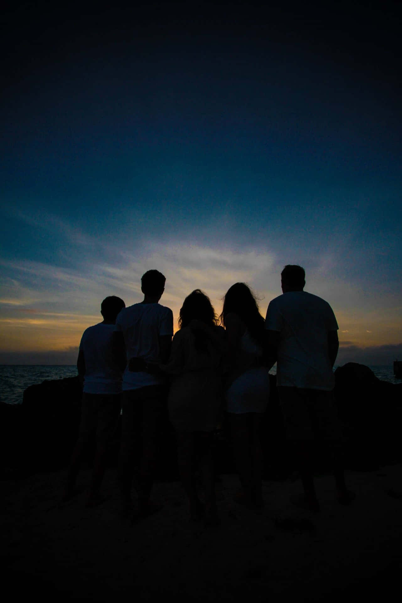 Group Of Friends Silhouette Looking At The Skies