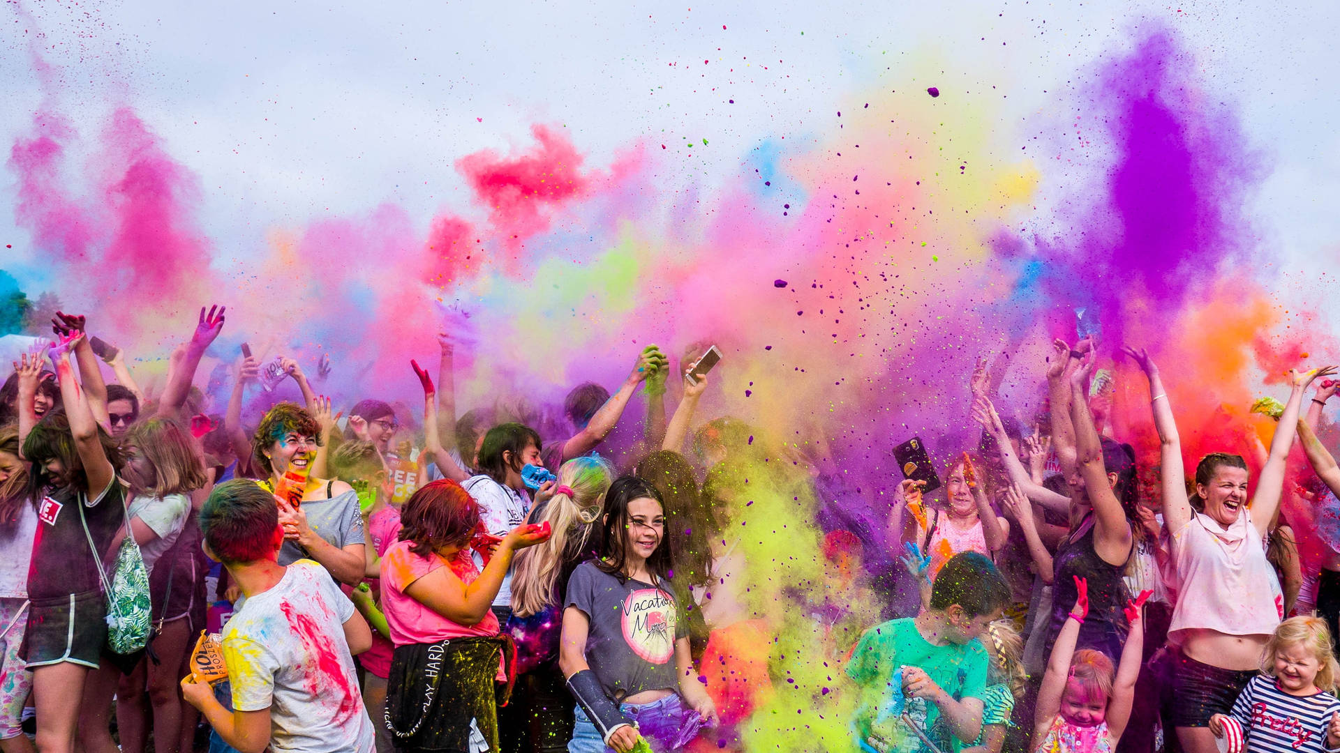 Group Of People In A Color Run Background