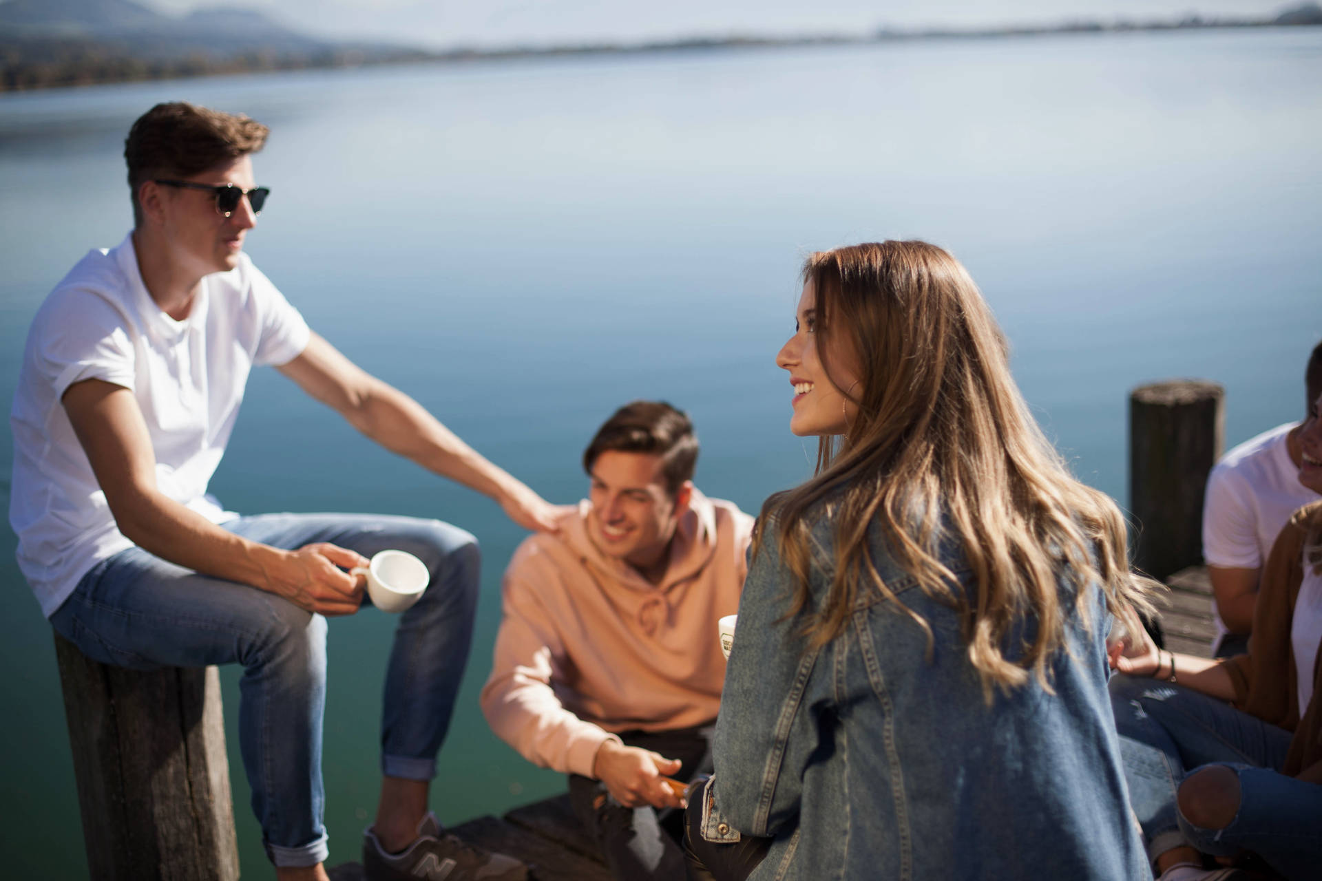 Group Of People On A Dock Background