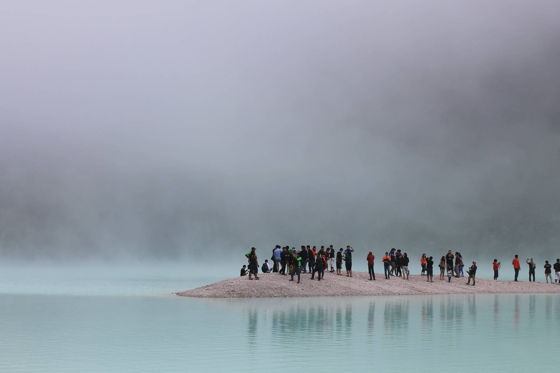 Group Of People On An Islet