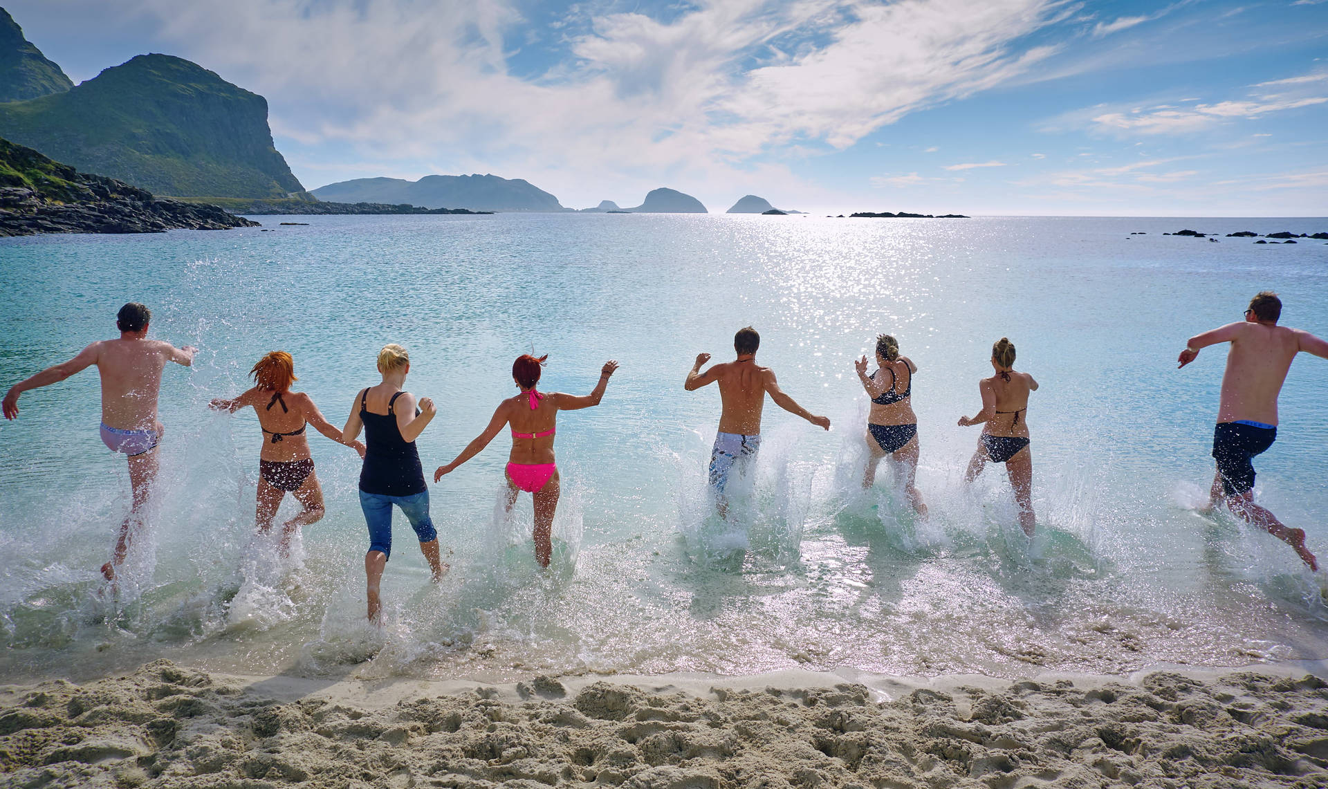 Group Of People Running To The Water Background