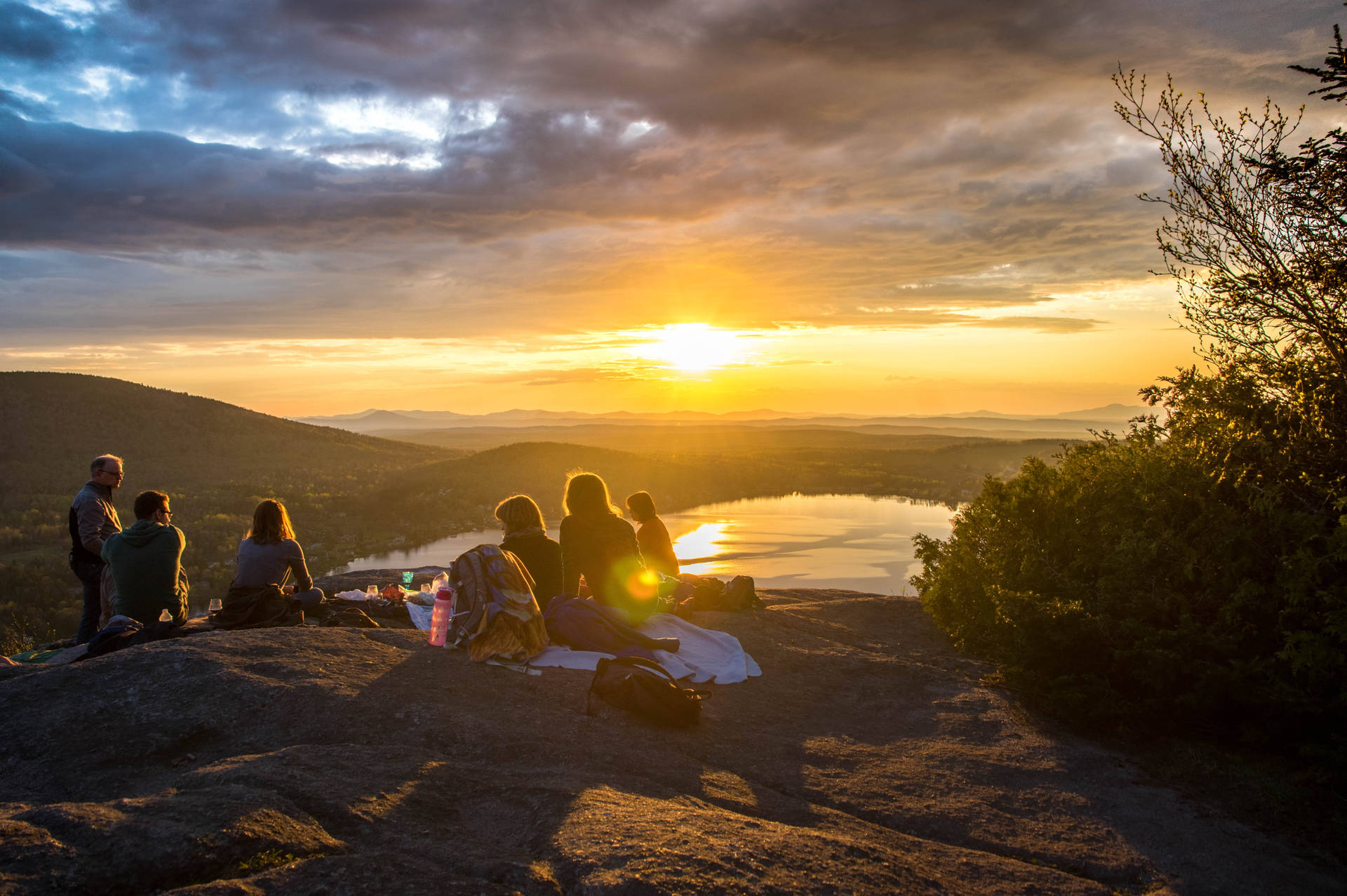 Group Of People Watching The Sunset Background