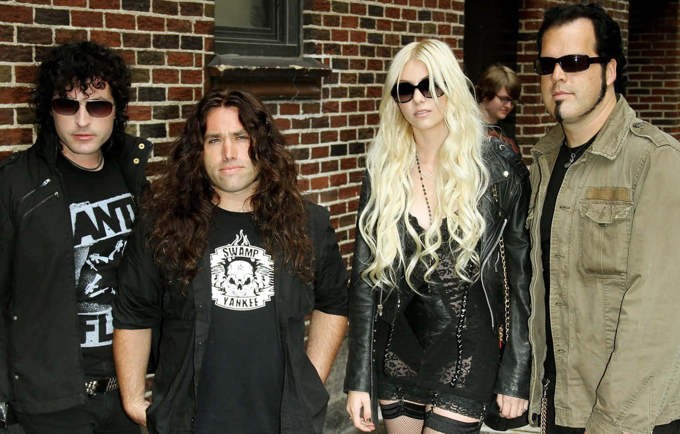 Group Photo Of The Pretty Reckless Band Background