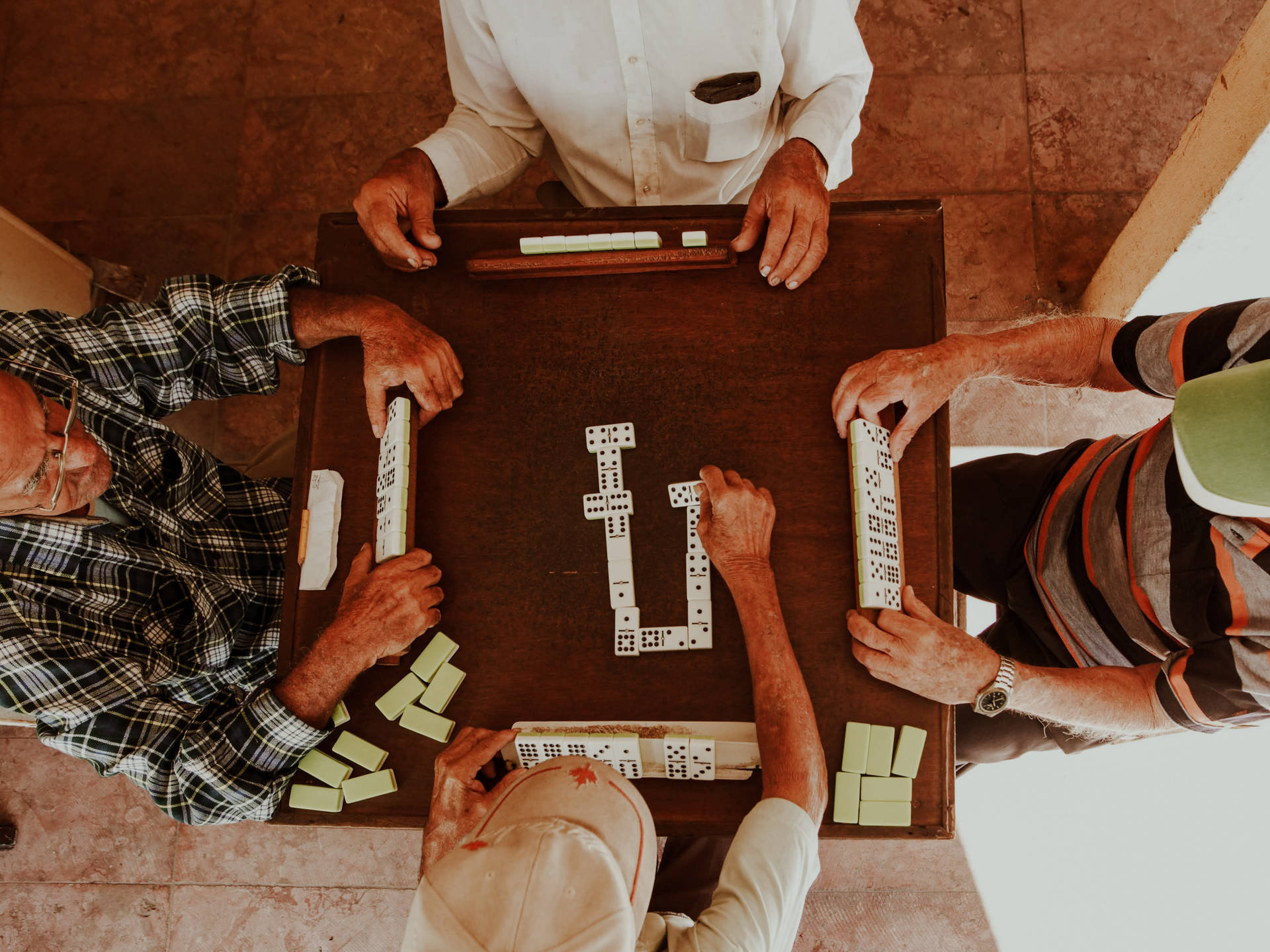 Group Playing Dominos Background