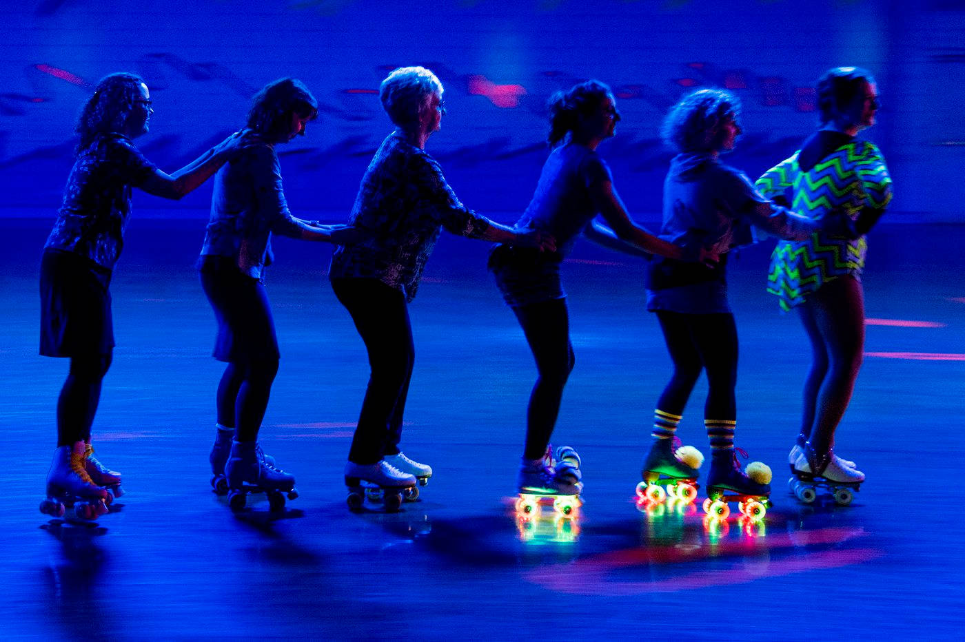 Group Rollerblading Glow In The Dark