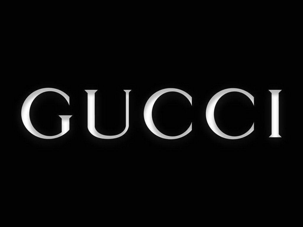 Gucci Logo On A Black Background