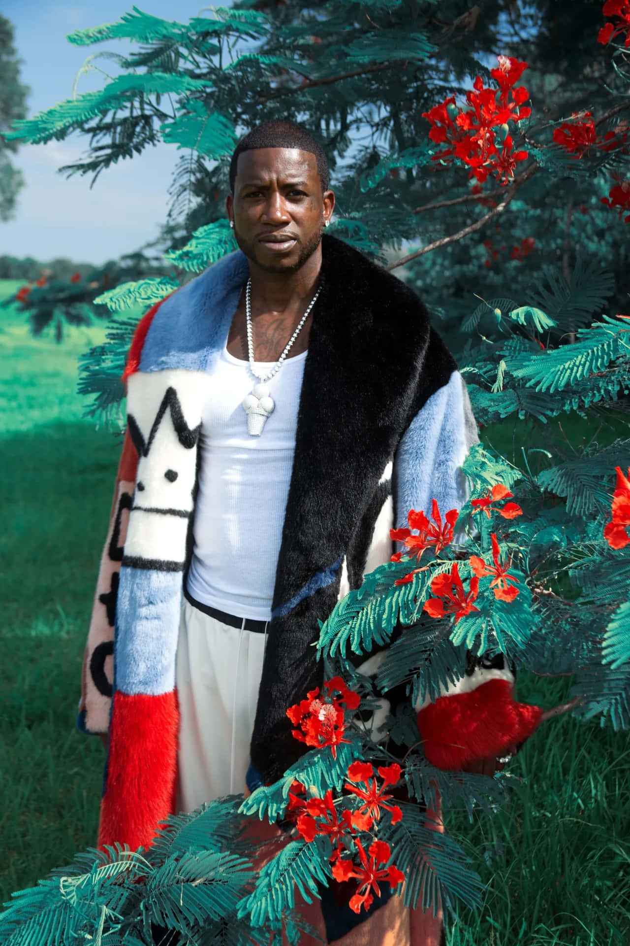 Gucci Mane_ Floral Backdrop_ Fur Coat.jpg Background