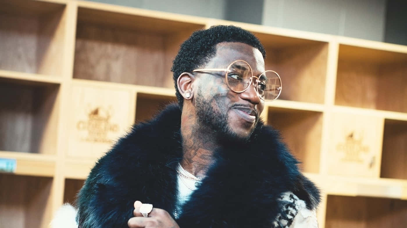 Gucci Mane Fur Coatand Glasses Background