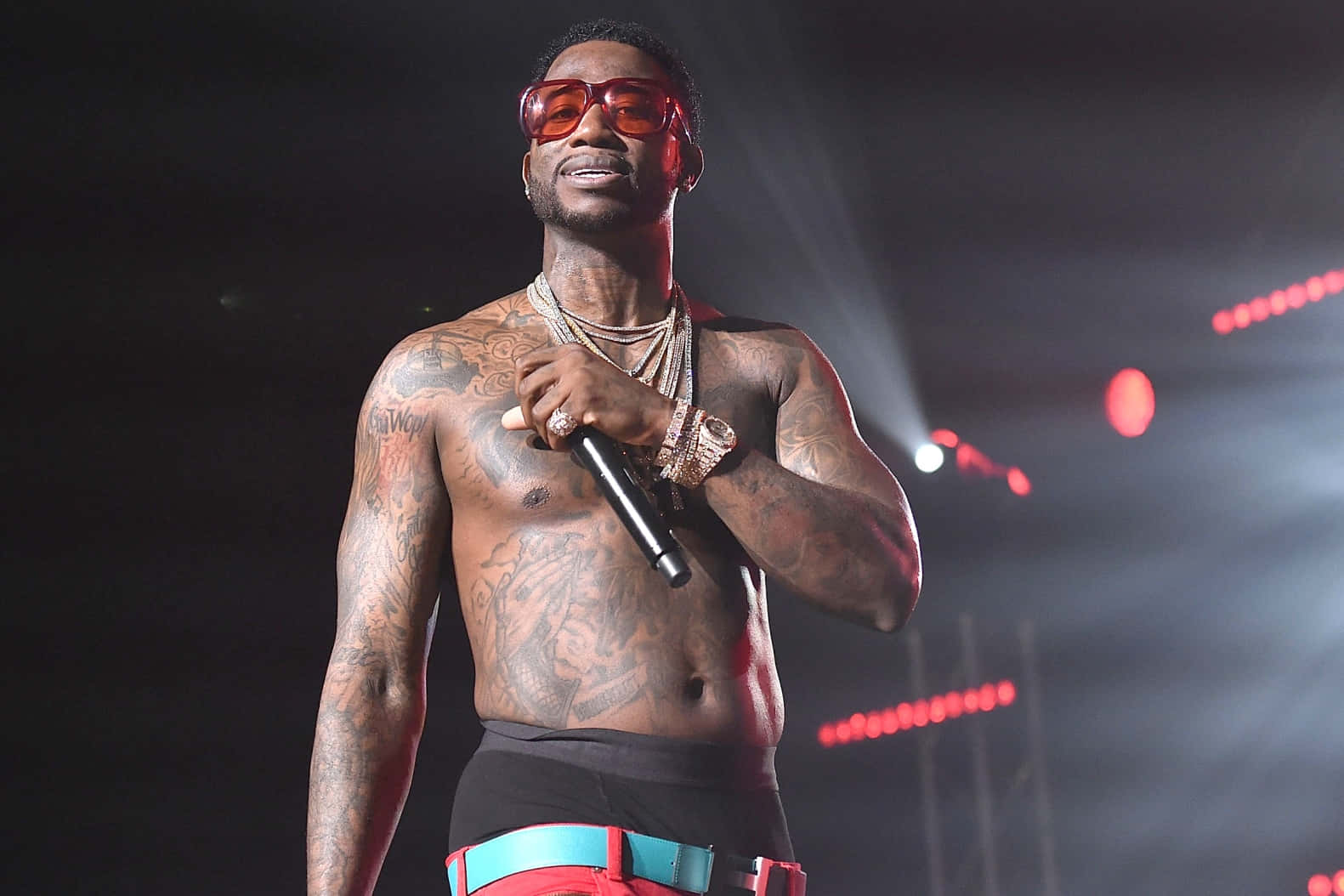 Gucci Mane Performingon Stage Background