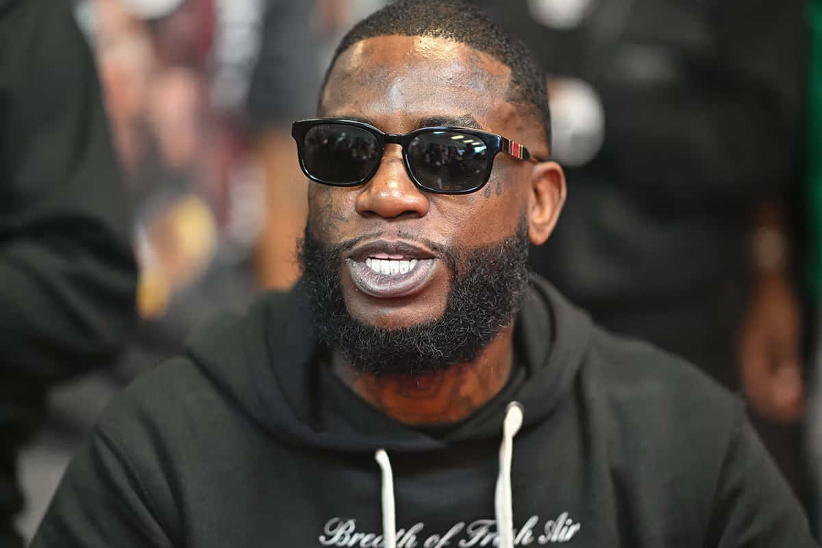 Gucci Mane Sunglassesand Hoodie Background