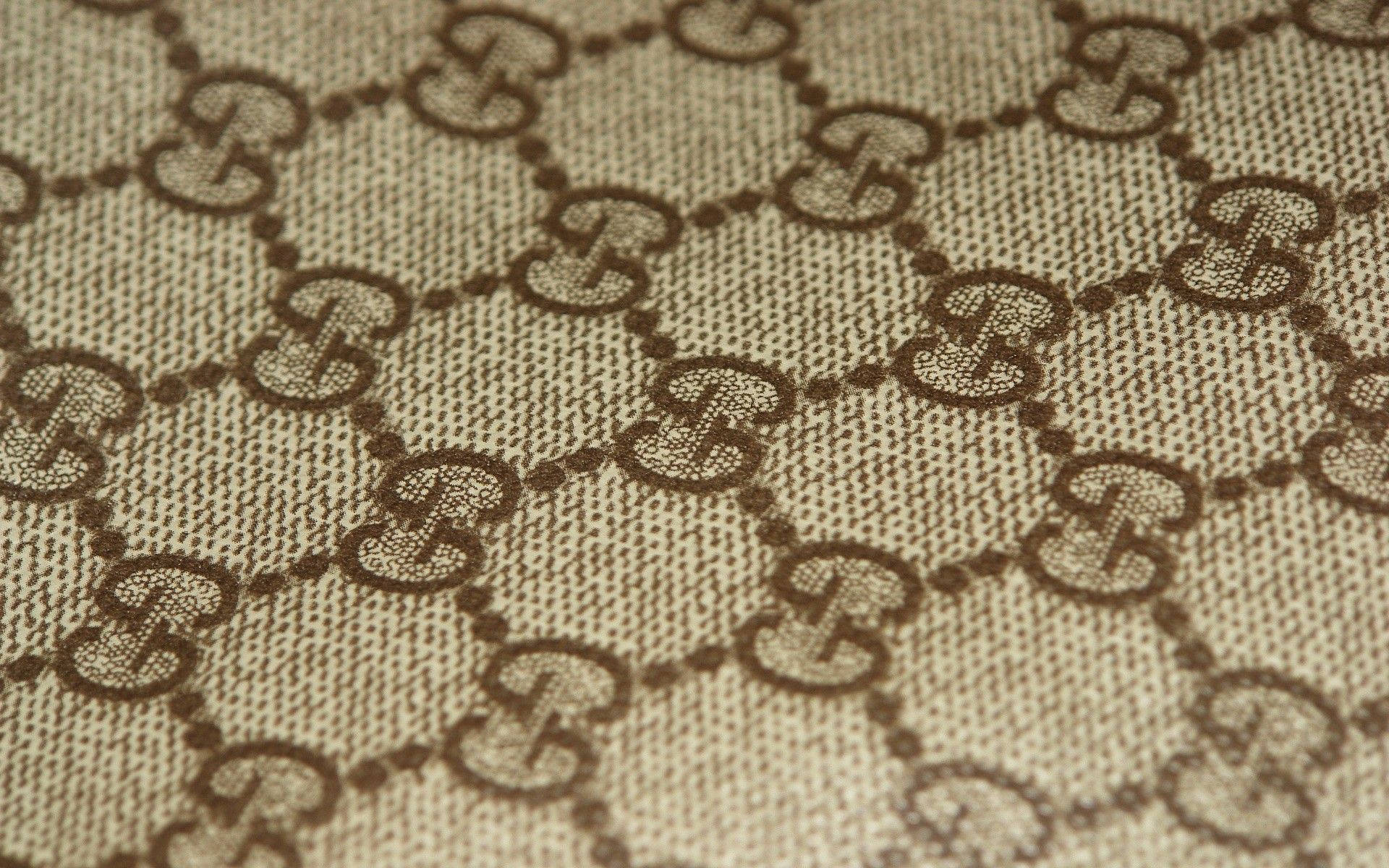 Gucci Pattern On Fabric Background