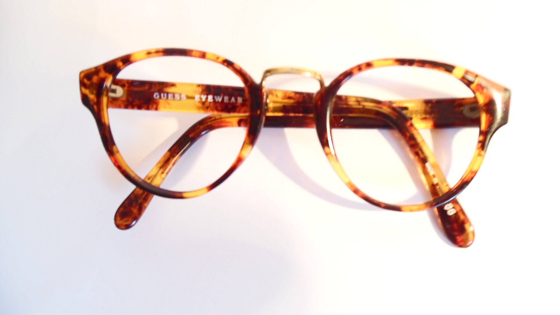 Guess Leopard Eyeglasses Background