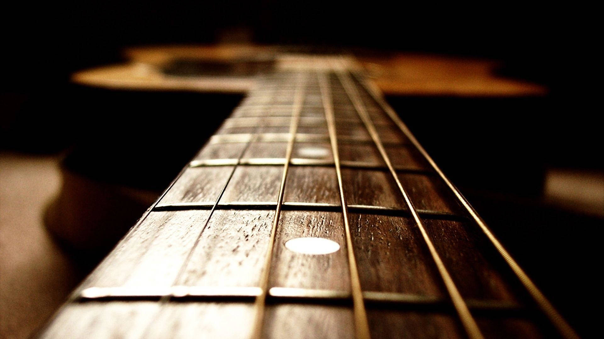 Guitar Fretboard Close-up Background