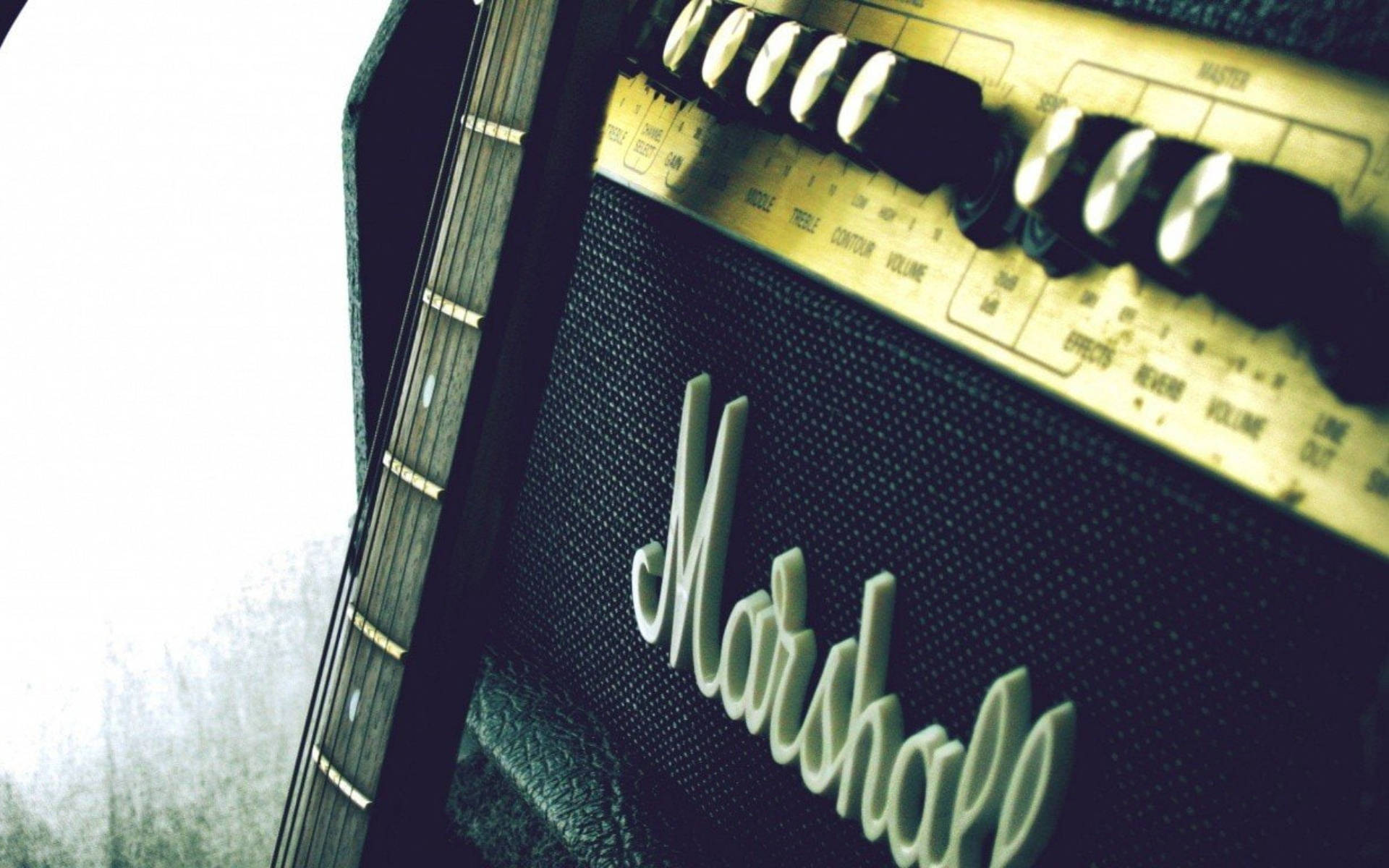 Guitar Leaning On Marshall Amplifier Background