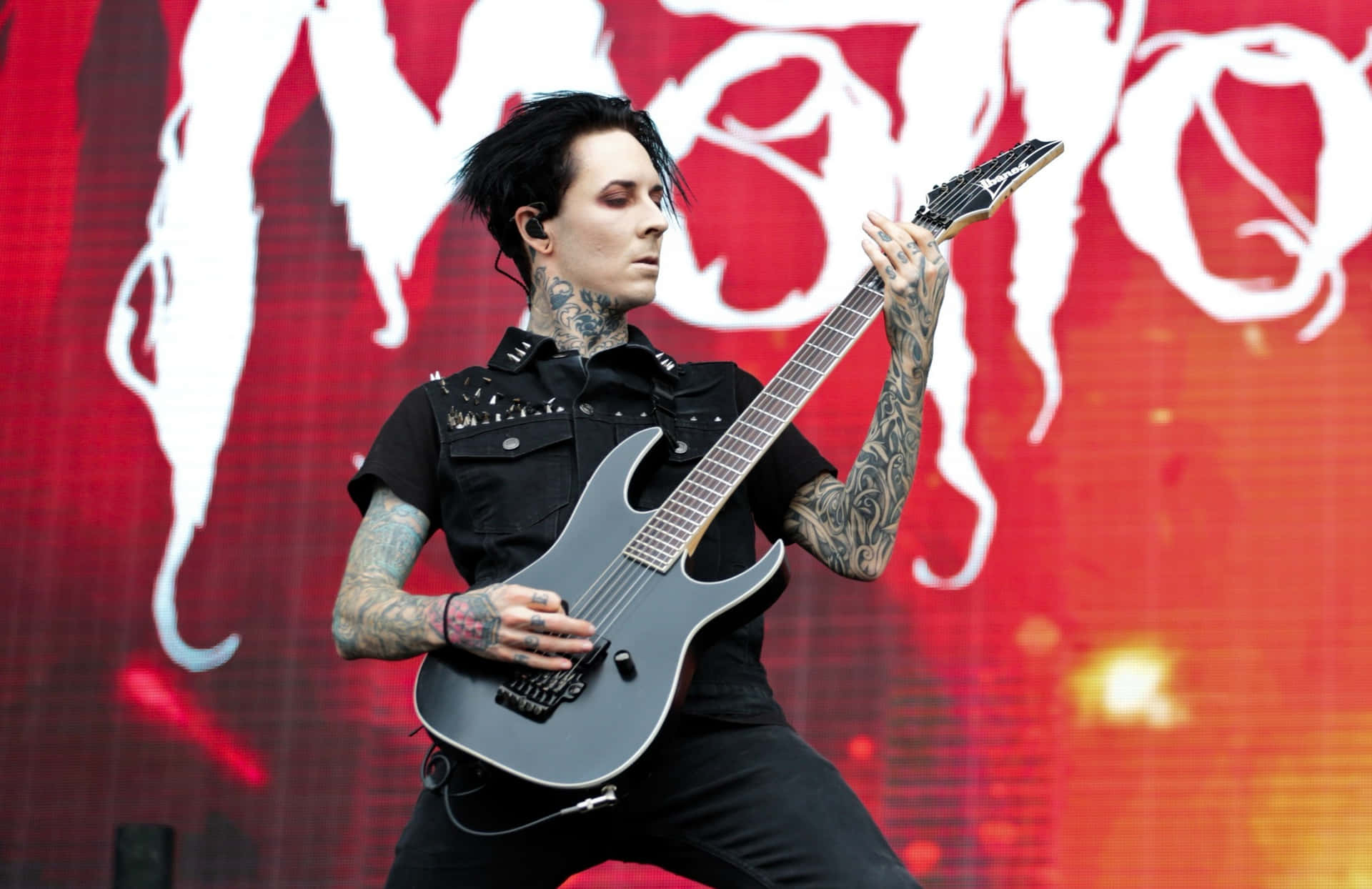 Guitariston Stage Motionlessin White Background