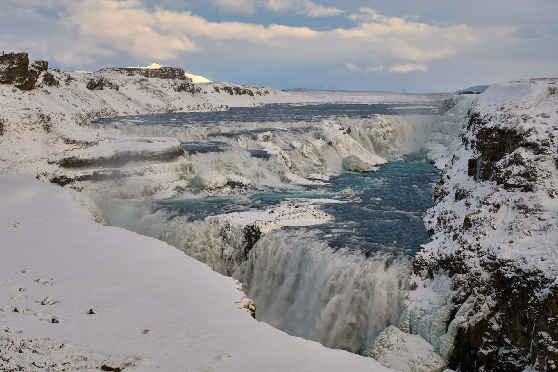 Gullfoss Waterfall With Blizzard In Southwest Iceland Background