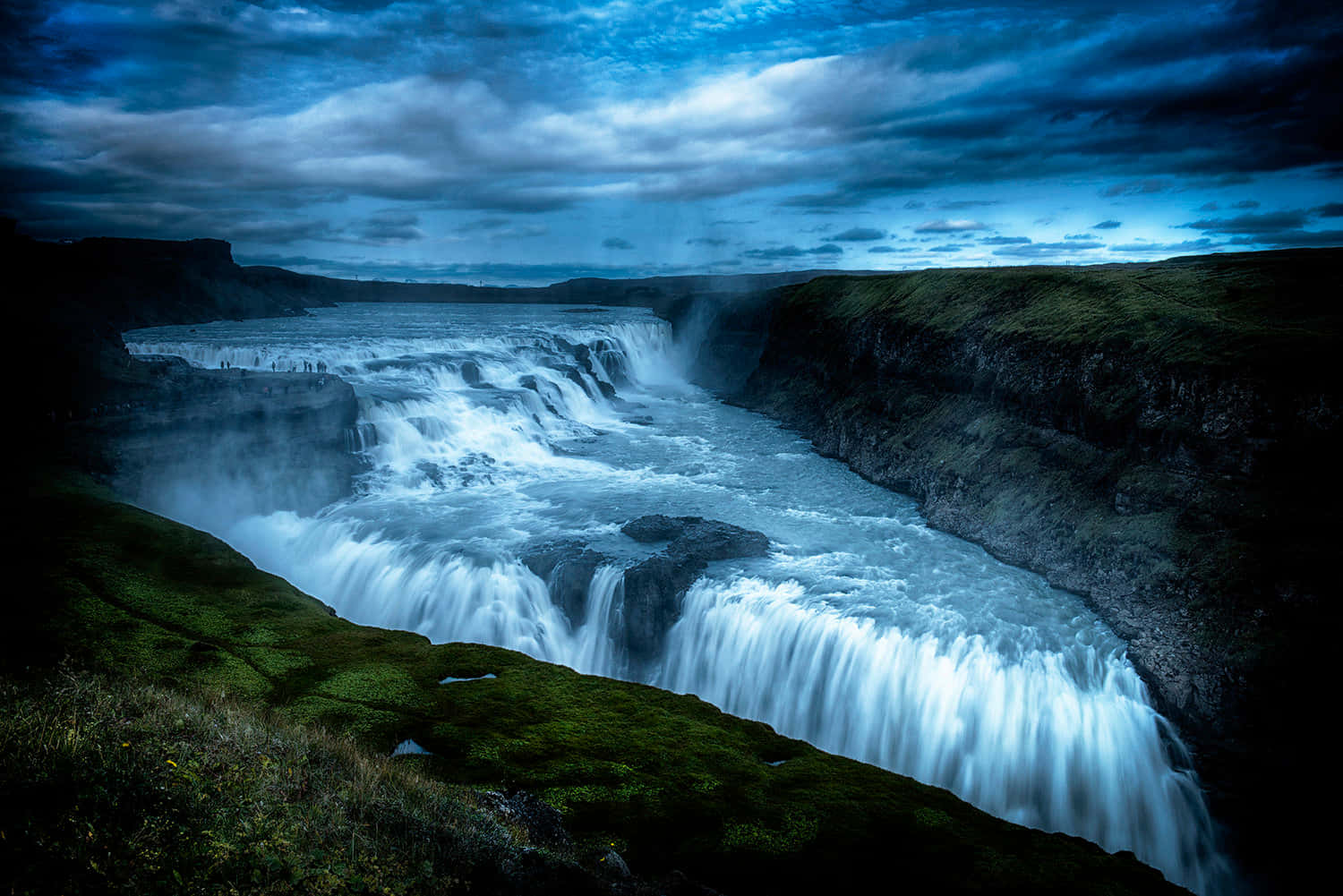 Gullfoss Waterfall With Dark Ambiance In Southwest Iceland Background