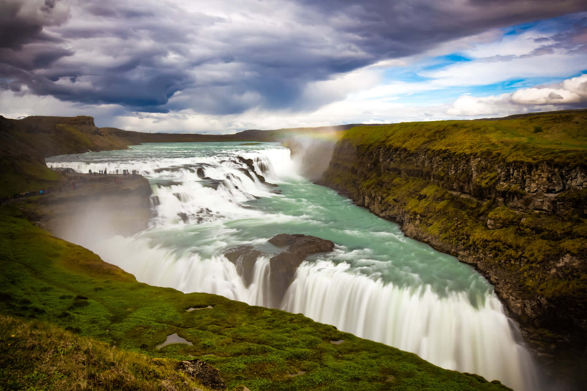Gullfoss Waterfall With Heavy Clouds In Southwest Iceland Background