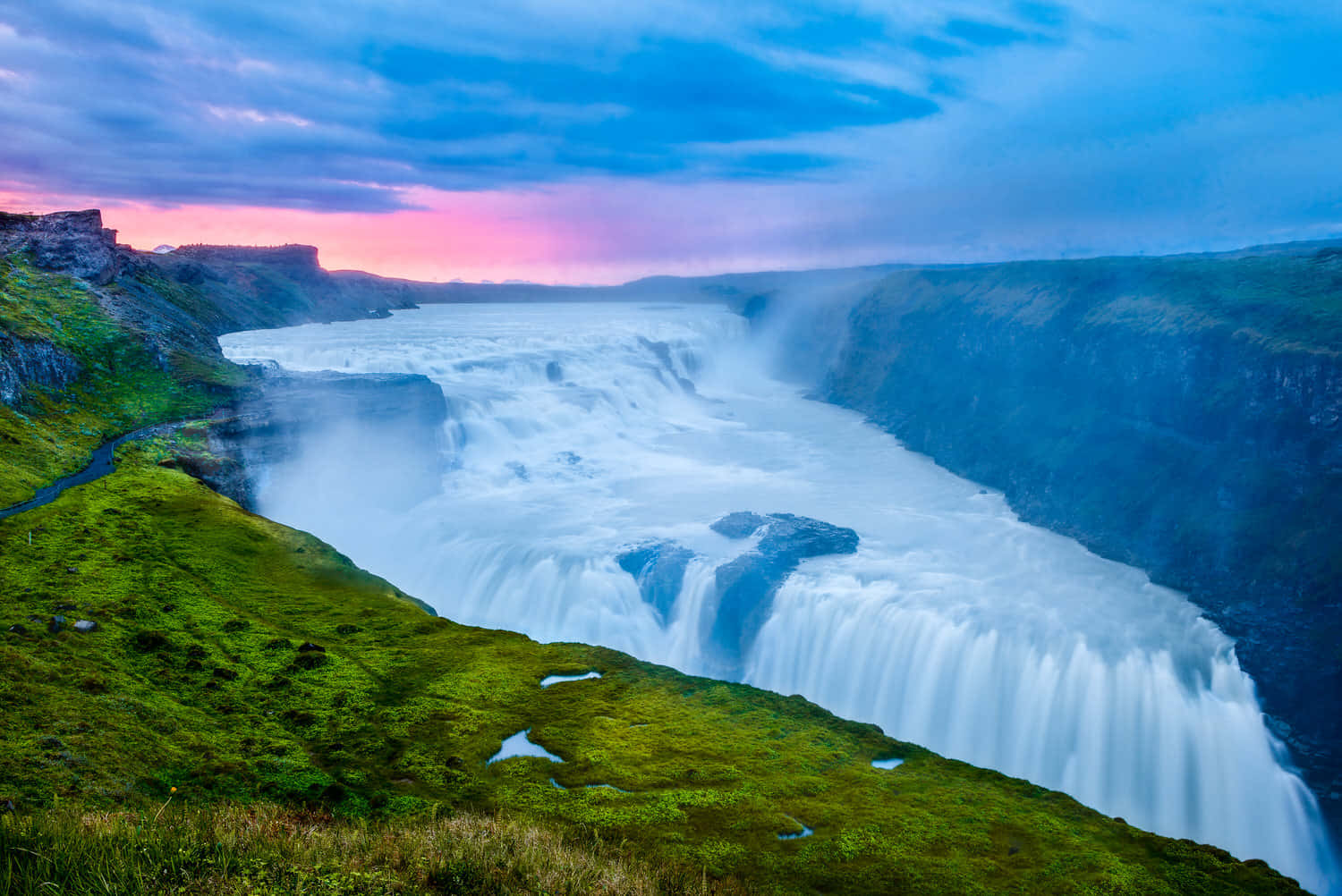 Gullfoss Waterfall With Pink Skies In Southwest Iceland Background