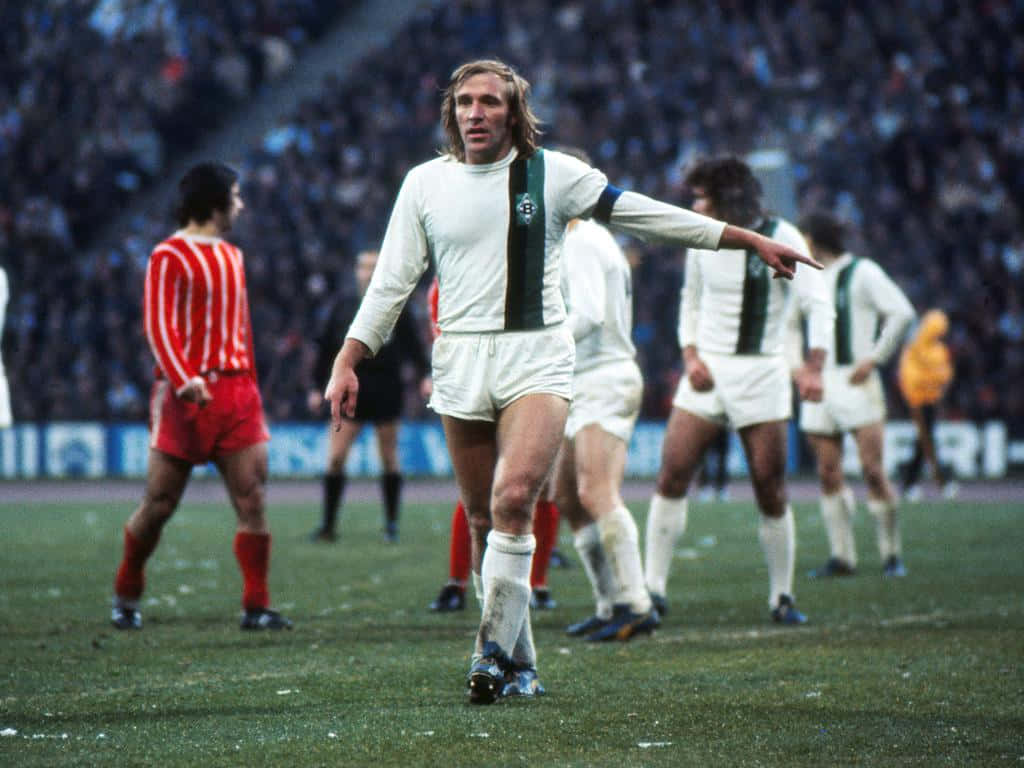Gunter Netzer In Action During Match Background