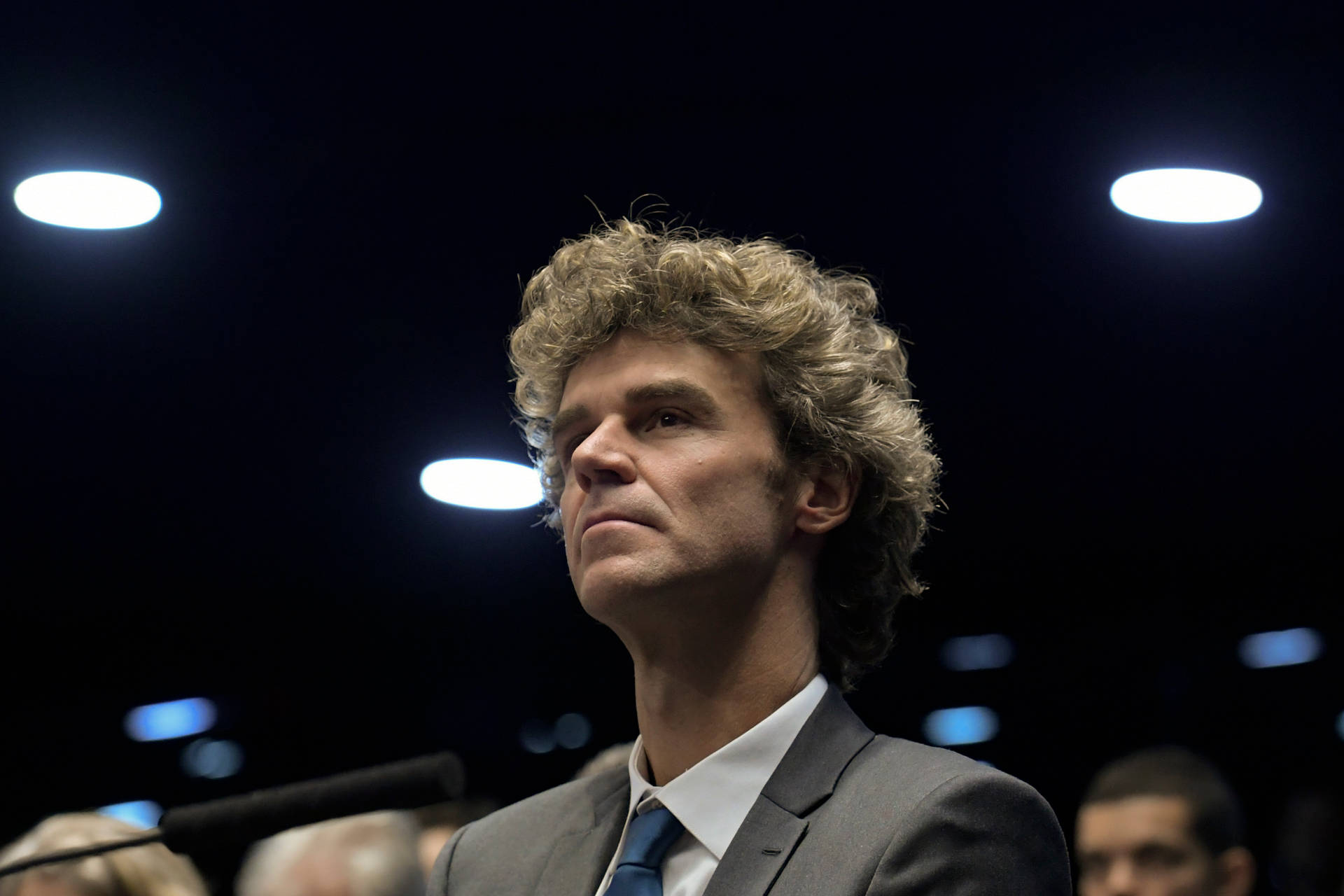 Gustavo Kuerten Looking Stylish In Blazer And Tie Background