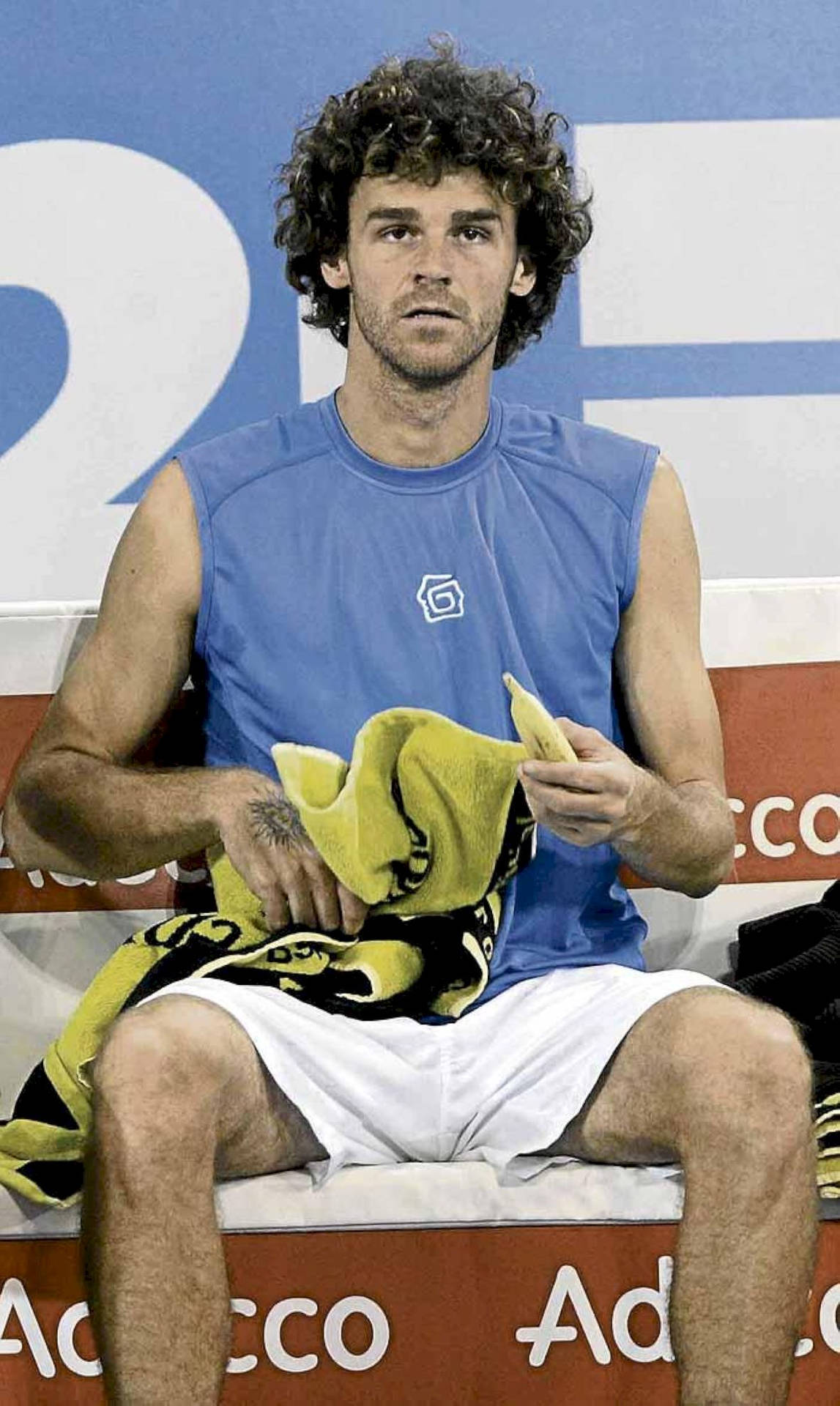 Gustavo Kuerten Sitting Down Background