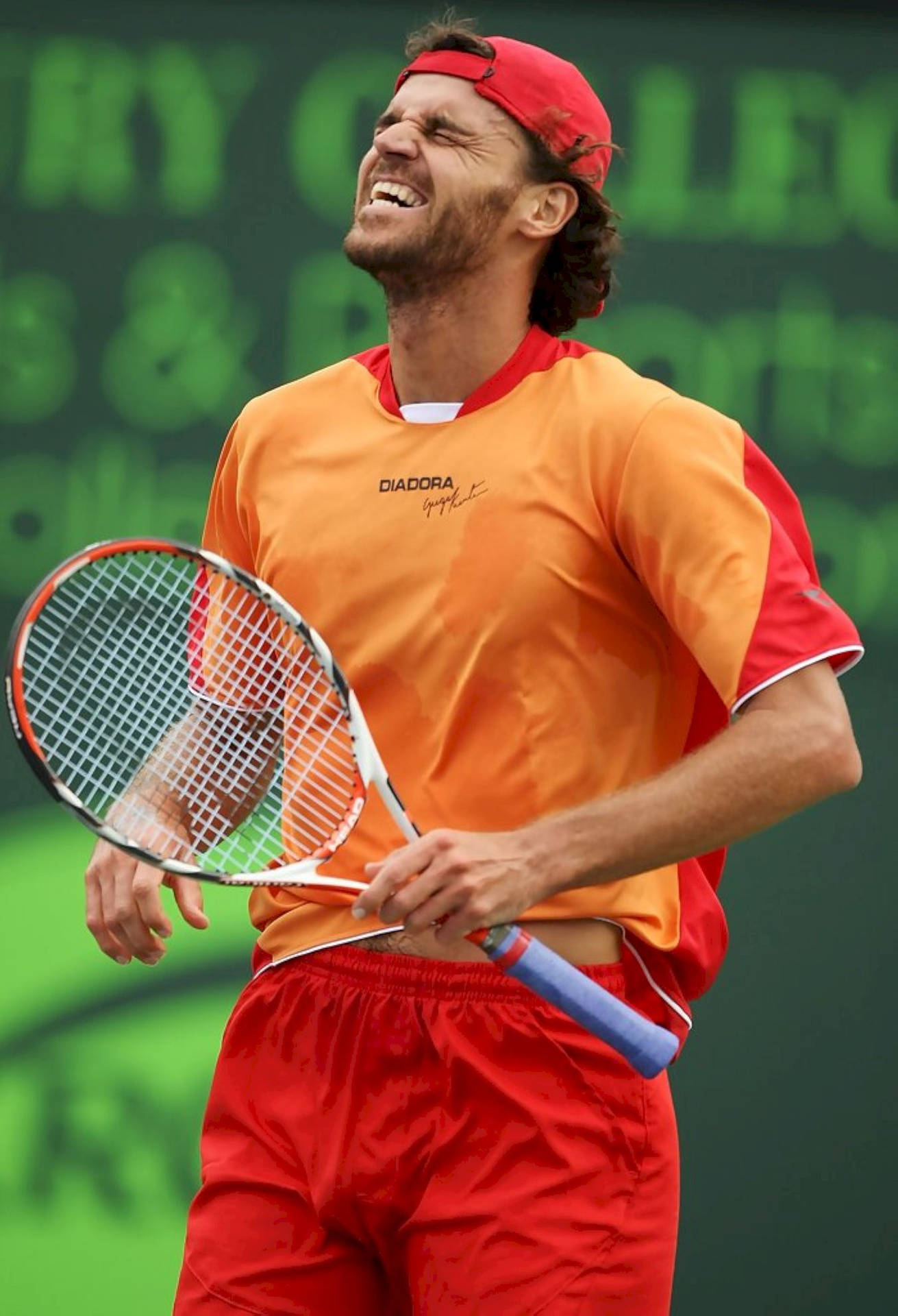 Gustavo Kuerten With A Gleeful Smile Background