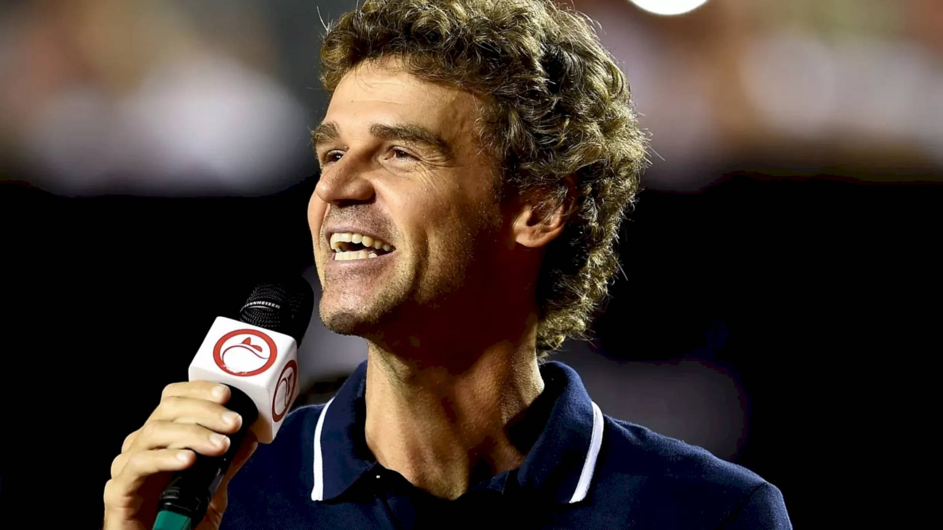 Gustavo Kuerten With A Microphone