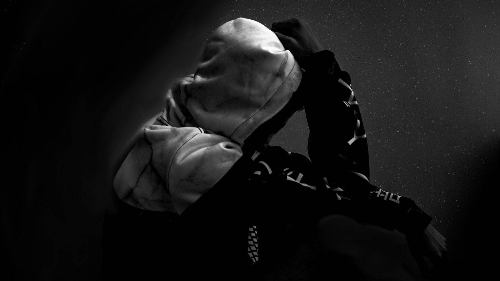 Guy In Black And White Hoodie Background