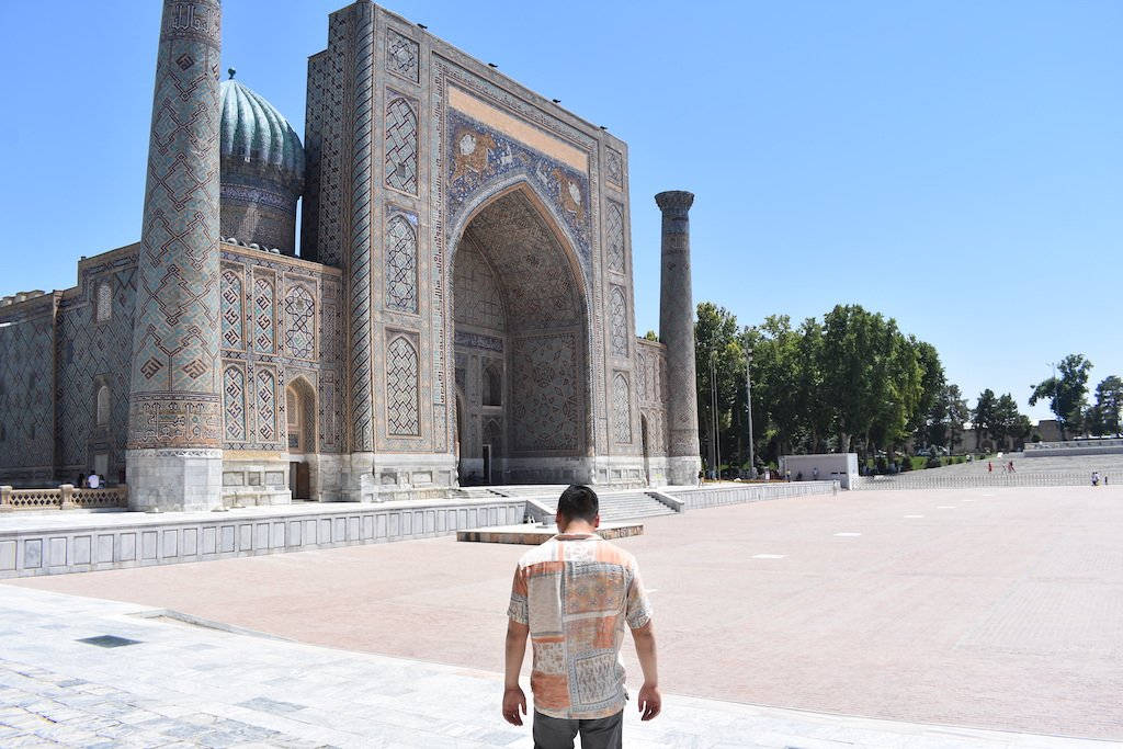 Guy Near Sherdor Madrassah Samarkand Background