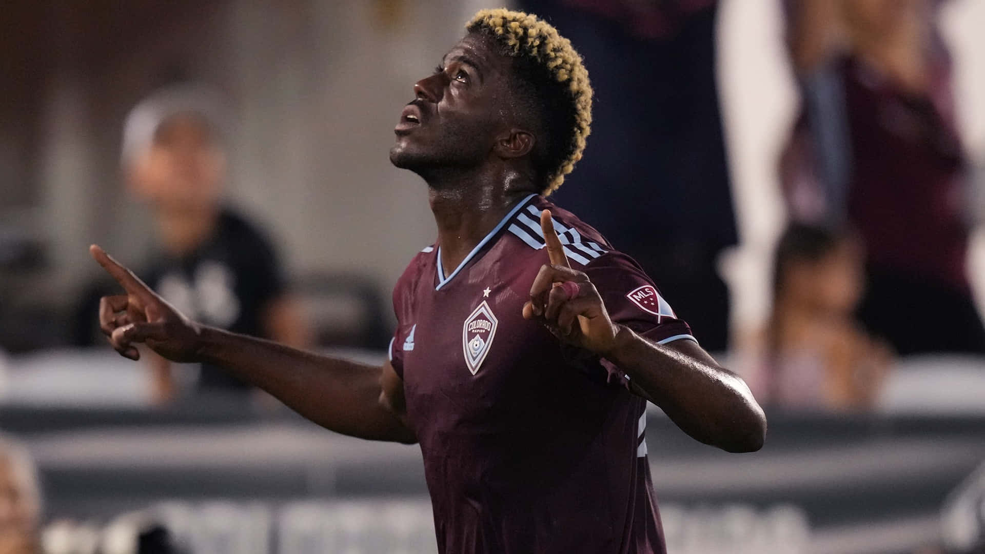 Gyasi Zardes Points To Sky Background