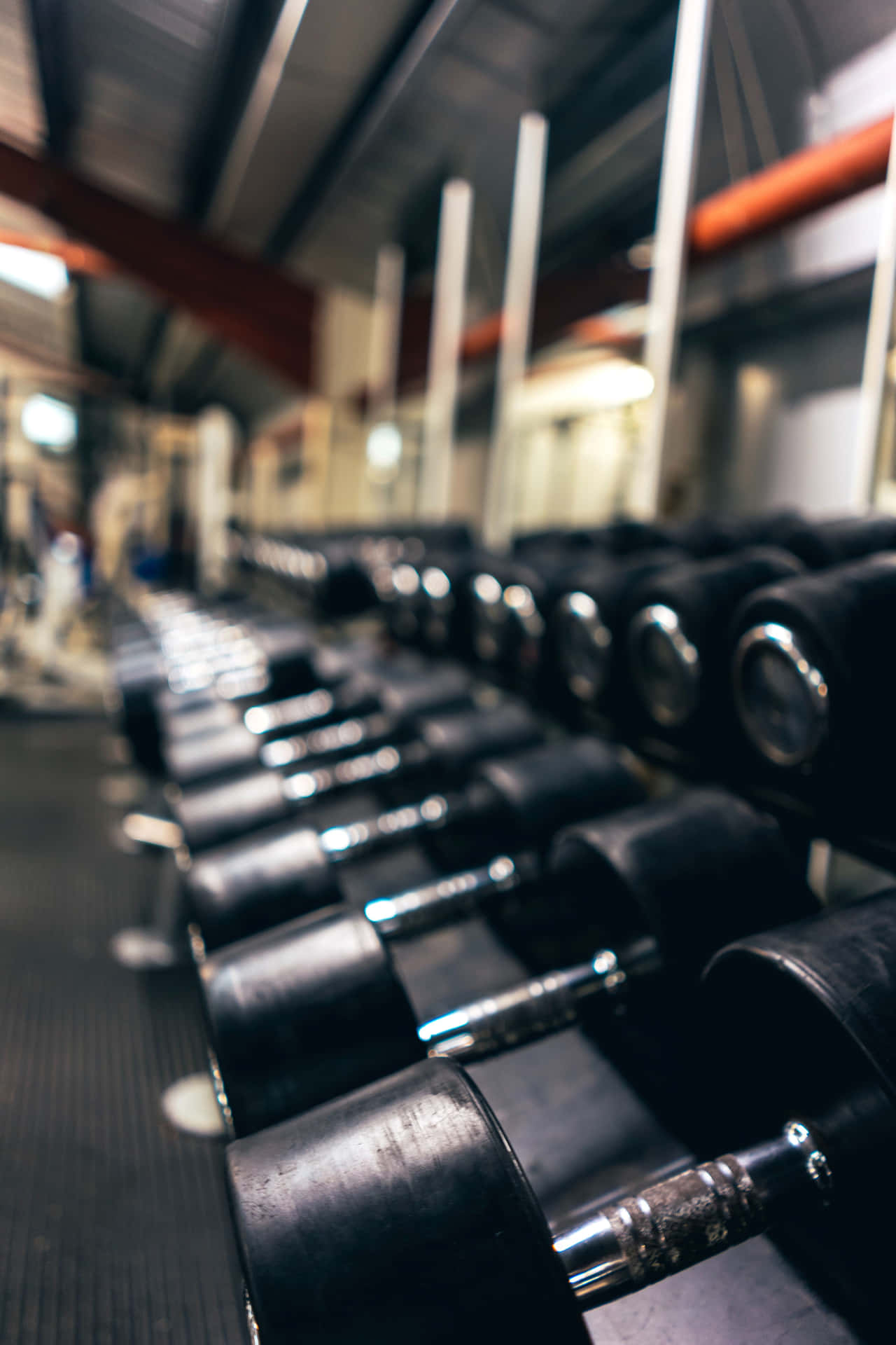 Gym Dumbbell Rack Focus Background