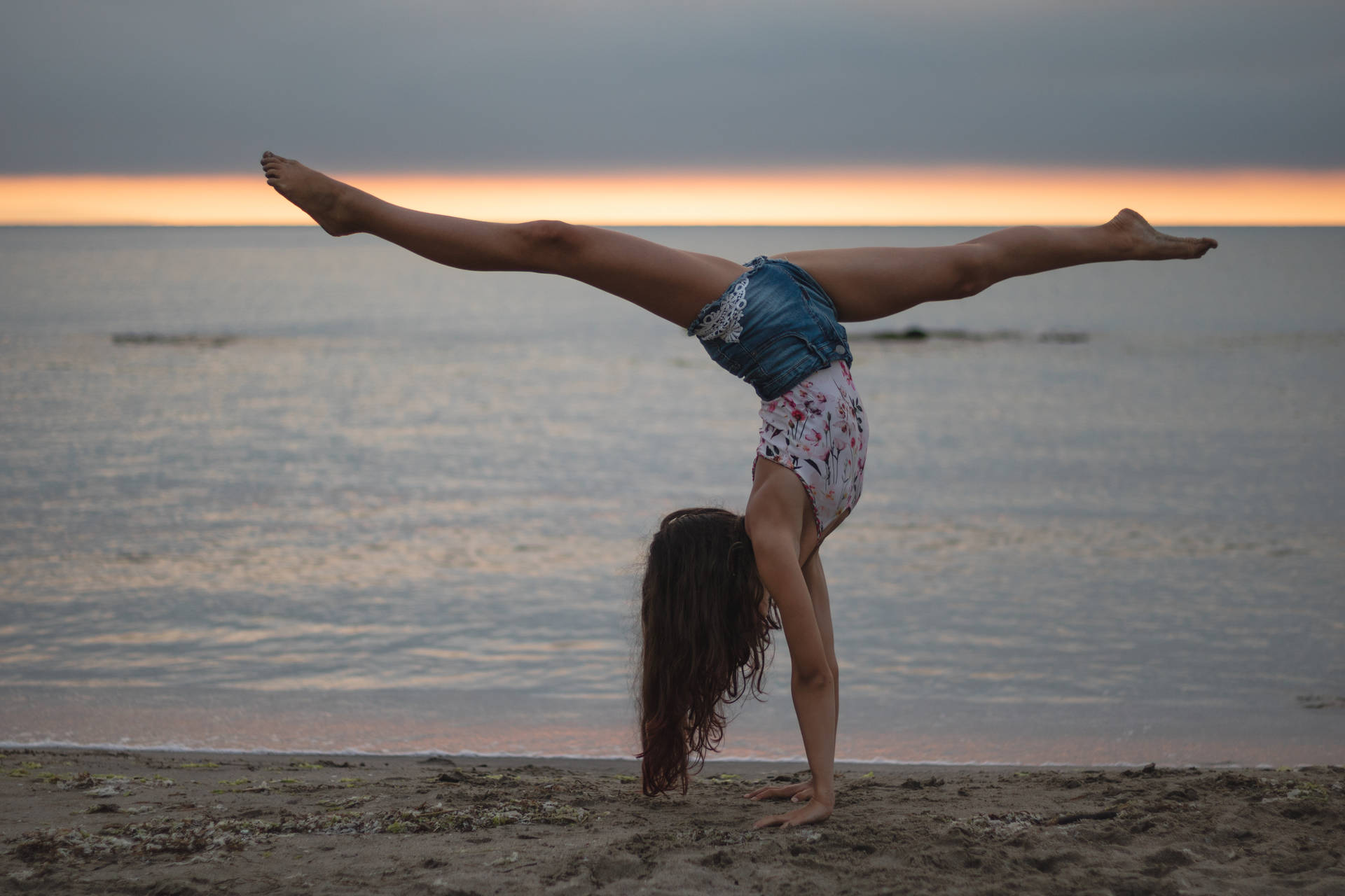 Gymnastics Seashore Sunset Background