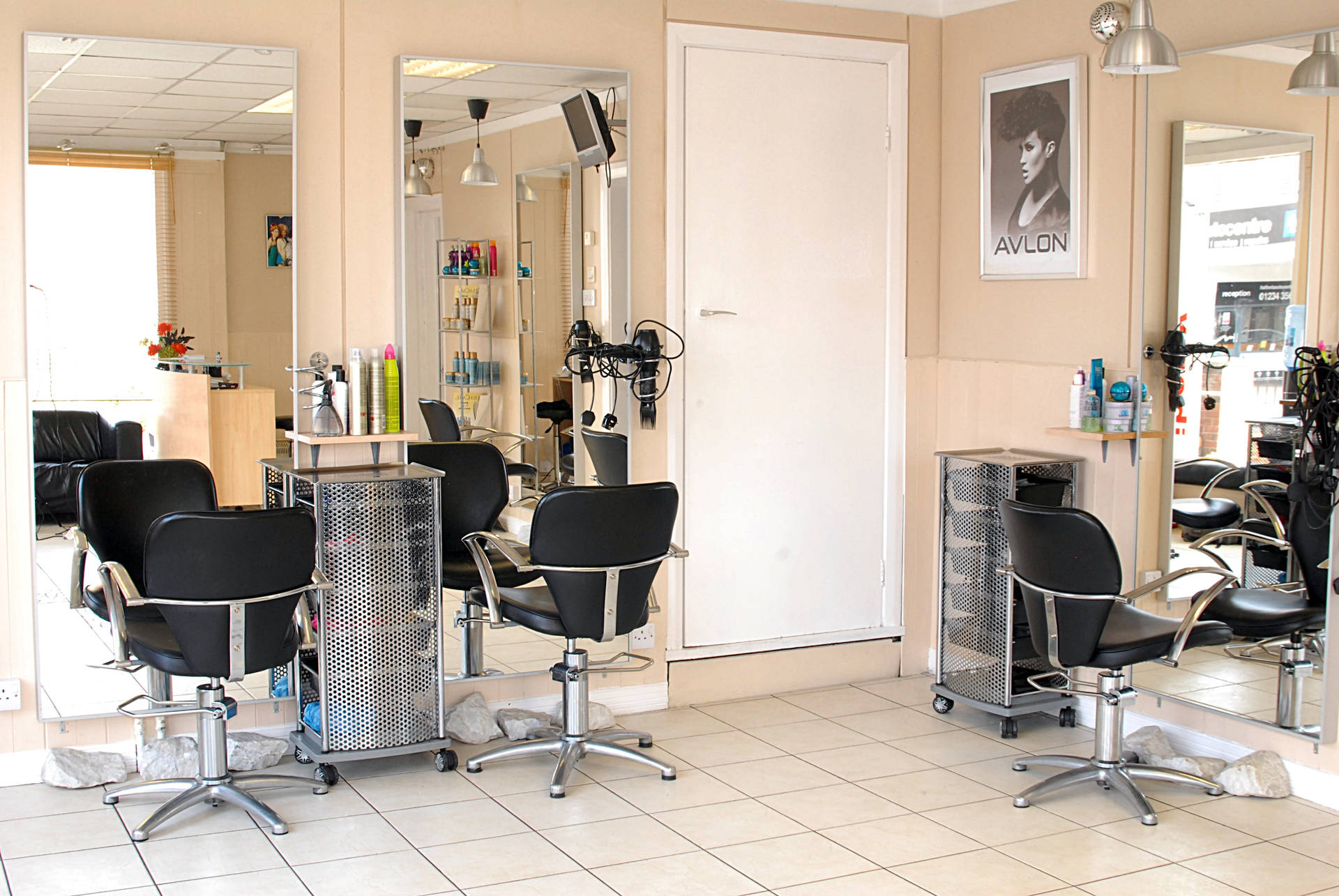 Hair Salon With Black Rolling Arm Chair Background