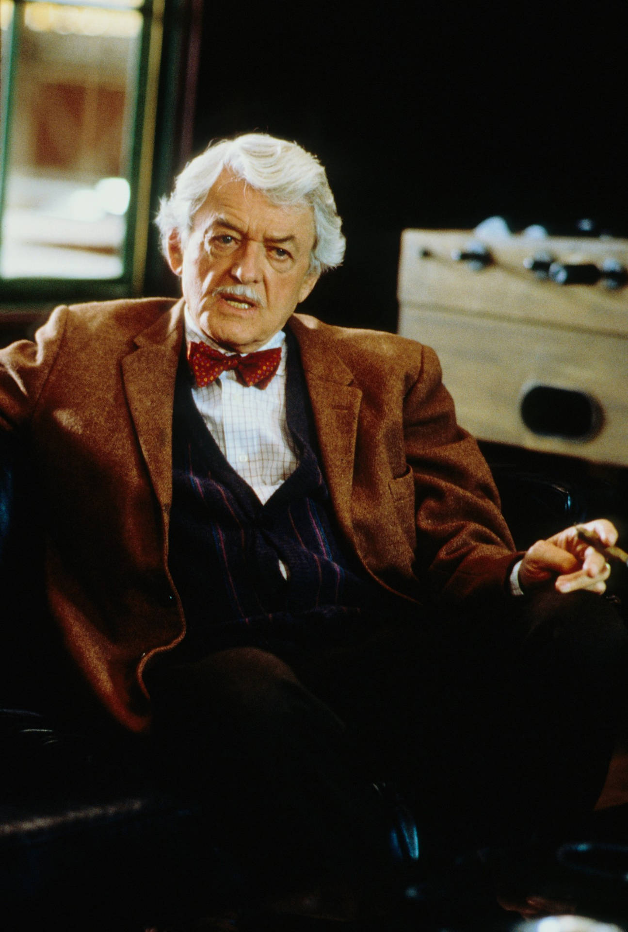 Hal Holbrook Holding A Cigar Background