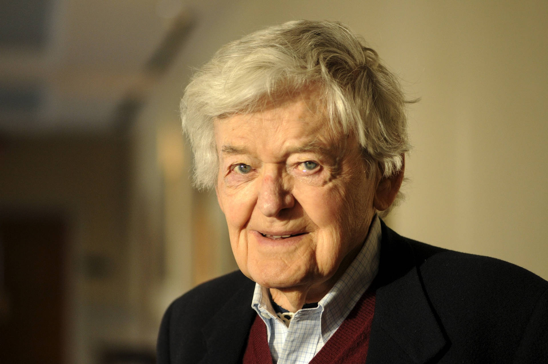 Hal Holbrook White Hair And Wrinkled Face Background