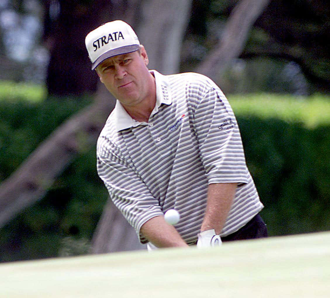 Hal Sutton Observing A Golf Ball