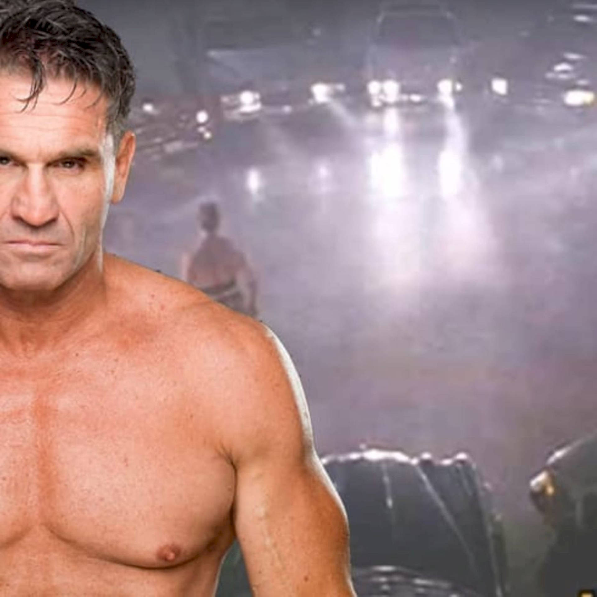 Half Image Of Ken Shamrock Background