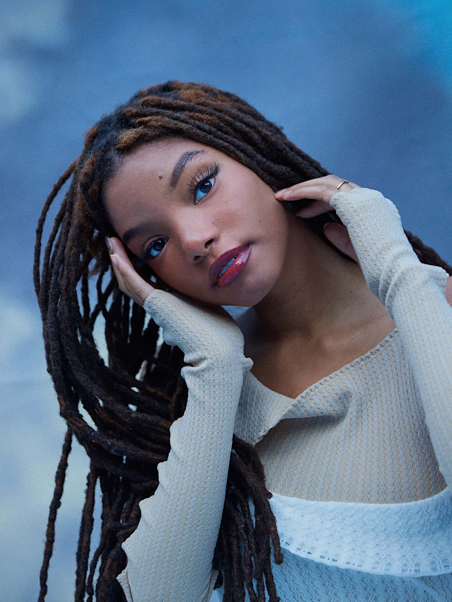 Halle Bailey Portrait Blue Backdrop Background