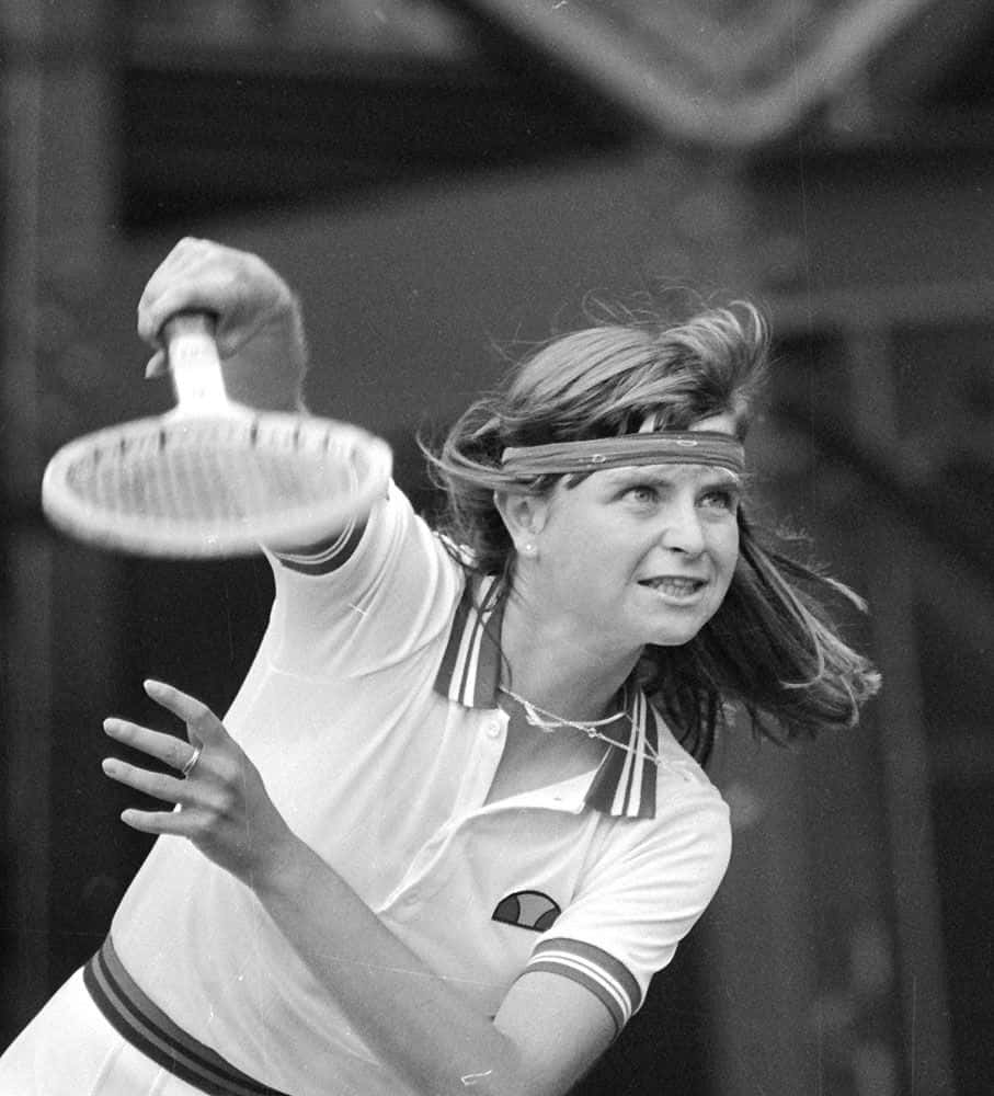 Hana Mandlikova Exhibiting Her Tennis Prowess On The Court Background